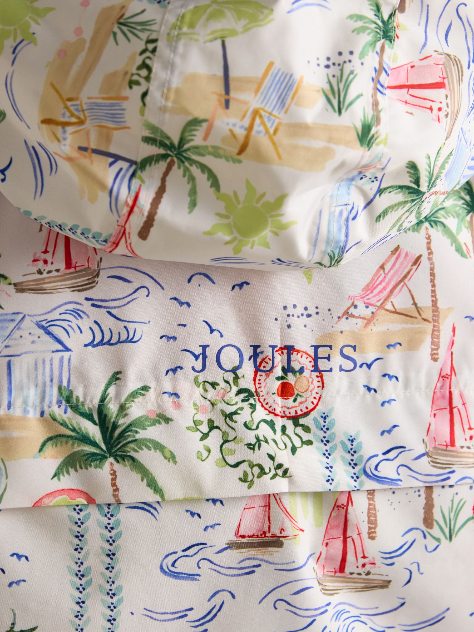 Rainly Coastal scene print Waterproof Packable Raincoat with Hood - Image 7 of 9