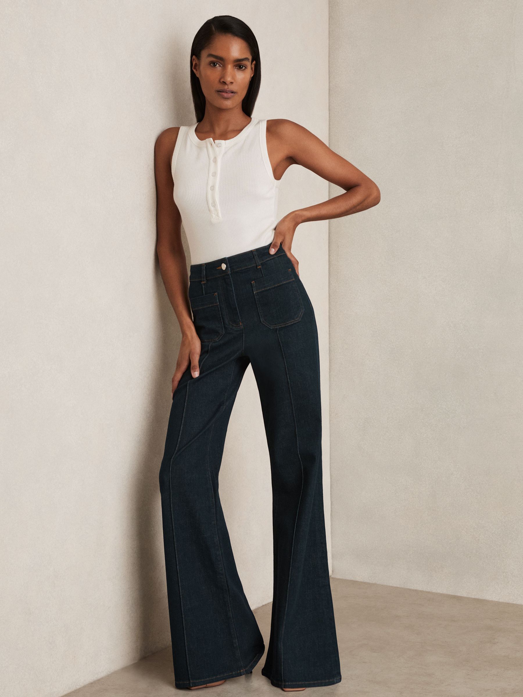 Petite Patch-Pocket Flared Jeans in Dark Blue - Image 1 of 8