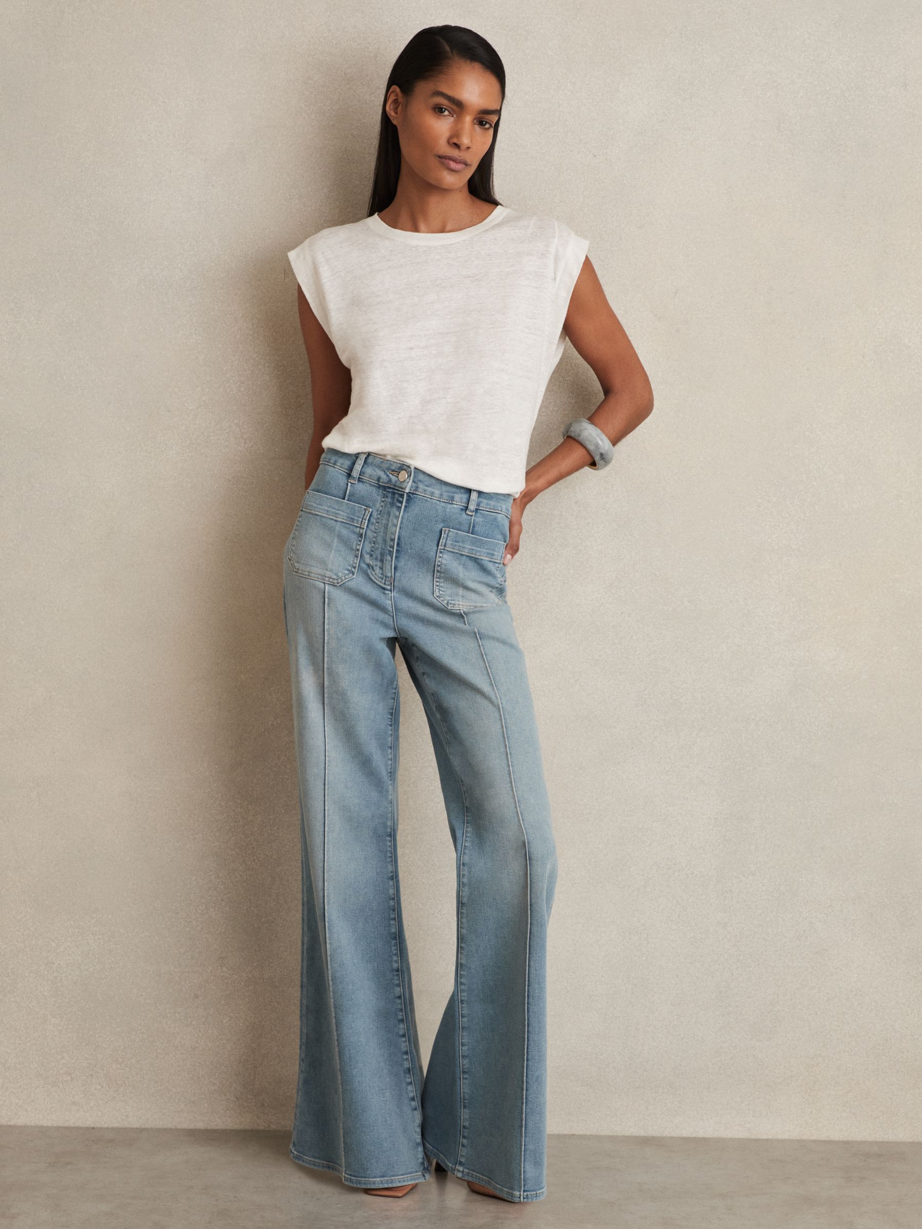 Patch Pocket Flared Jeans in Light Blue - Image 1 of 7