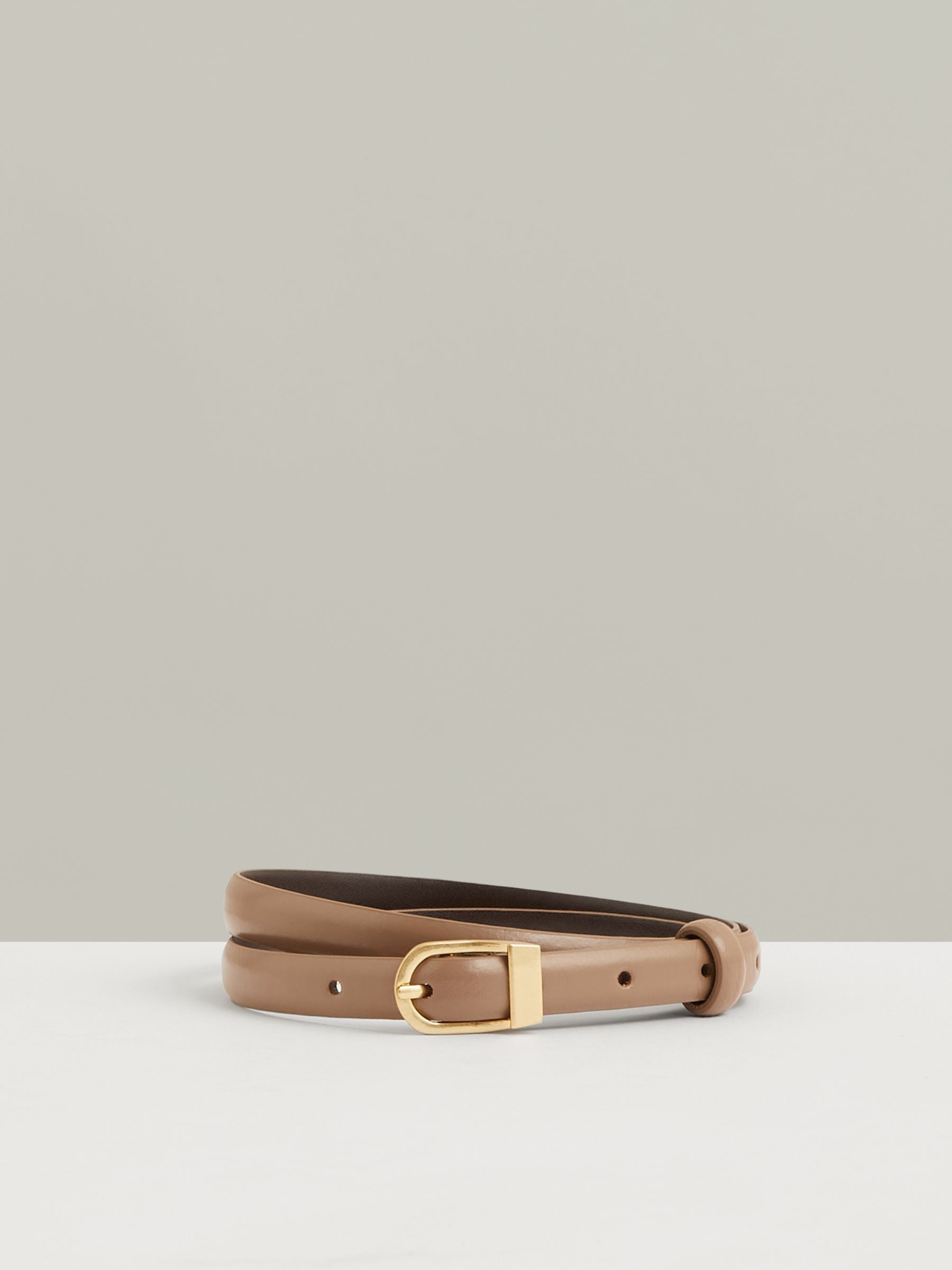 Leather Curved-Buckle Skinny Belt in Taupe - Image 1 of 4 Leather Curved-Buckle Skinny Belt in Taupe - Image 1 of 4