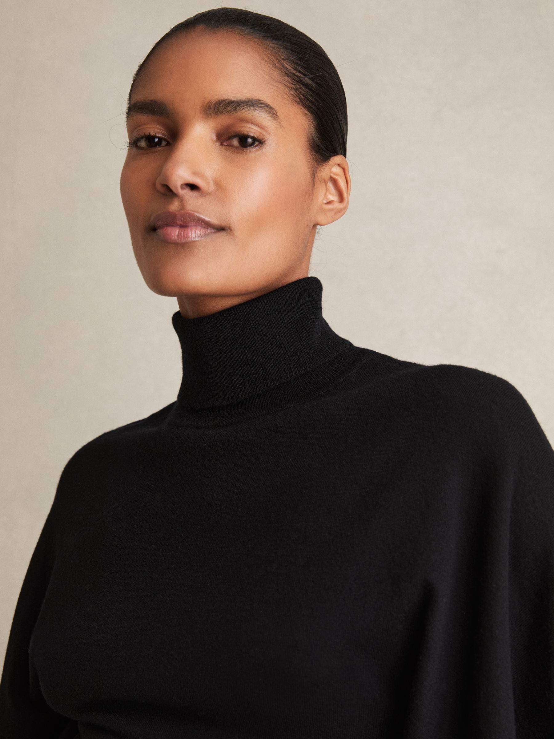 Merino Wool Batwing Roll-Neck Jumper in Black - Image 4 of 7