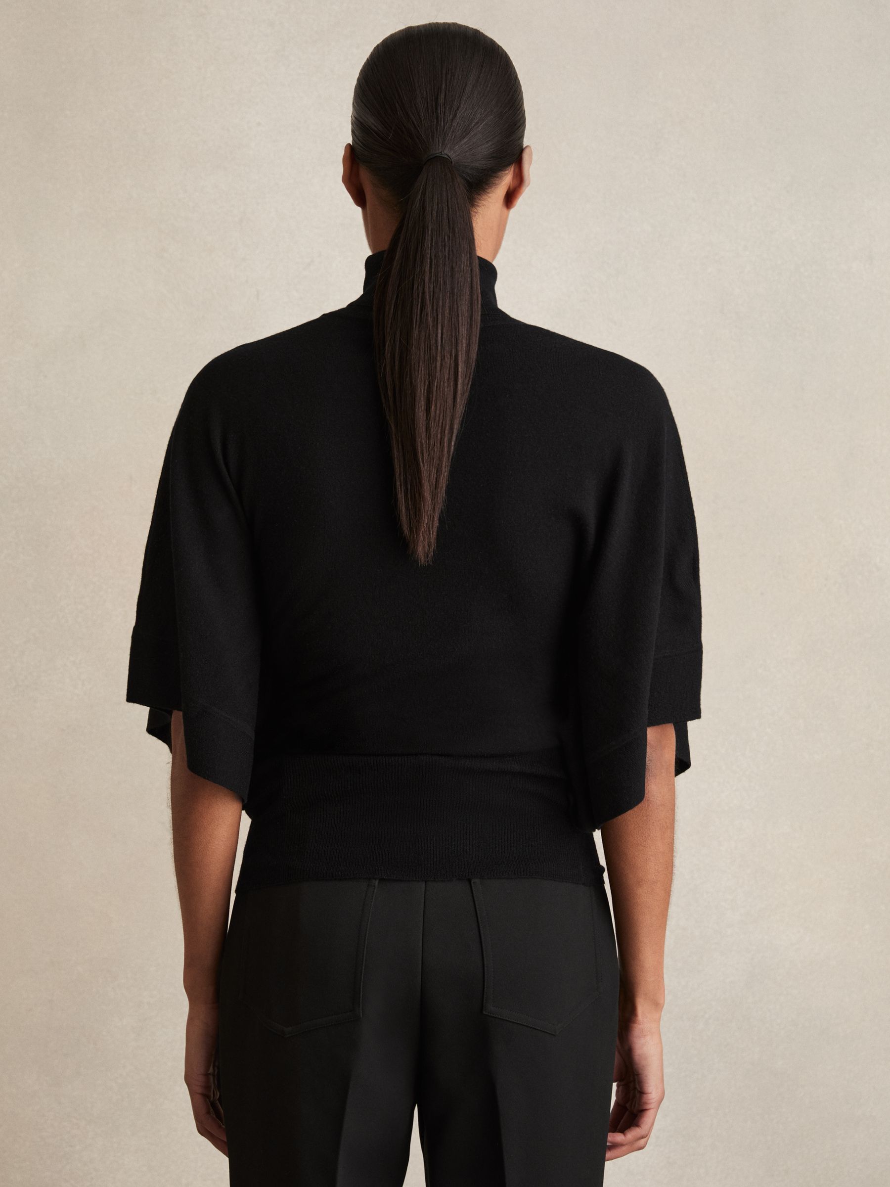 Merino Wool Batwing Roll-Neck Jumper in Black - Image 6 of 7