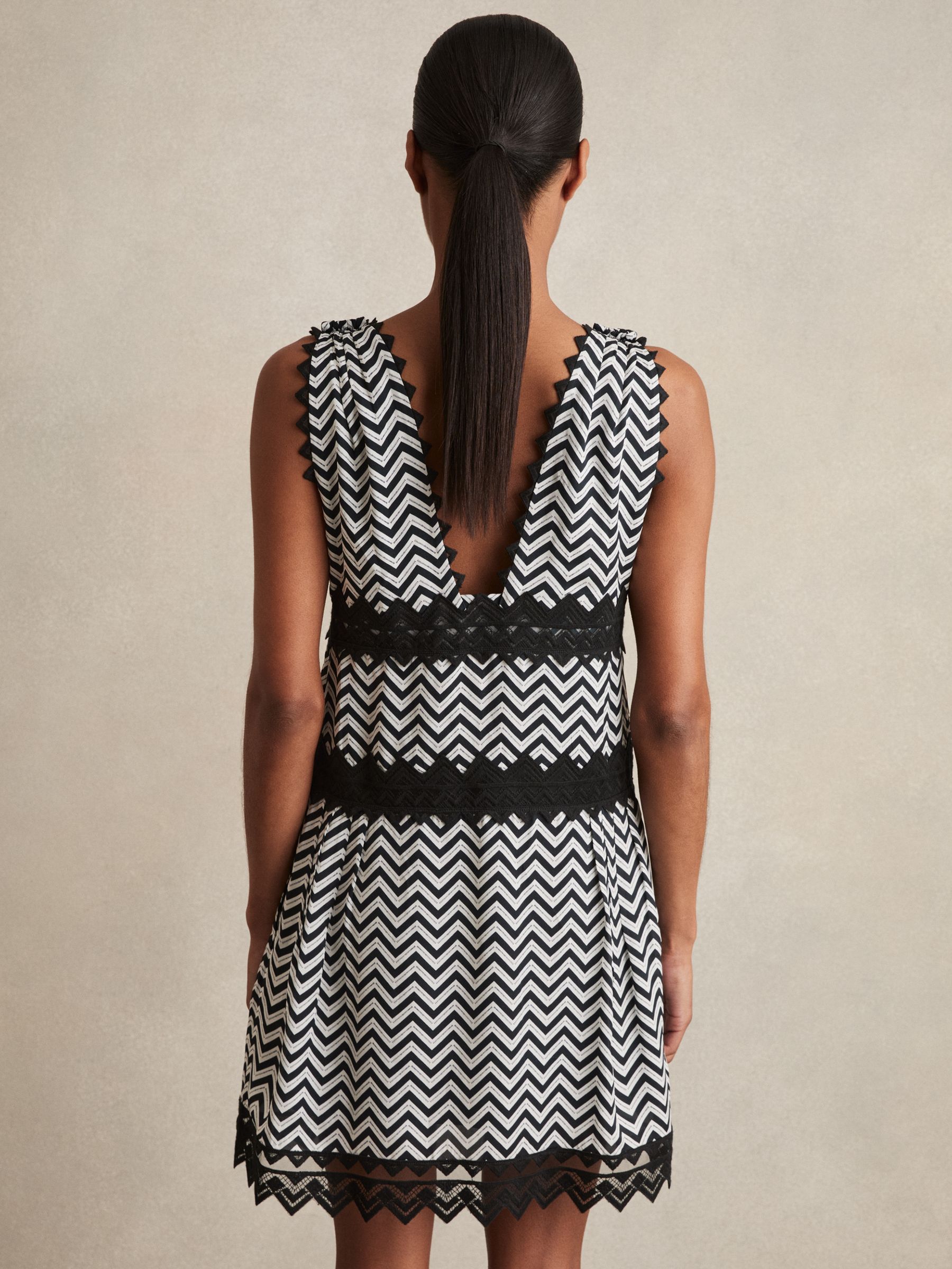 Zig-Zag Print Lace-Trim Mini Dress in Navy - image 5