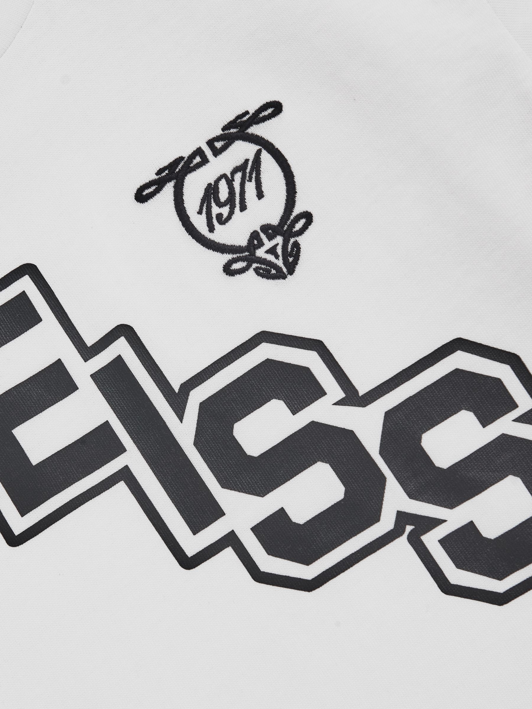 3-9 yrs Cotton Oversized Logo T-Shirt in White/Navy - Image 4 of 4