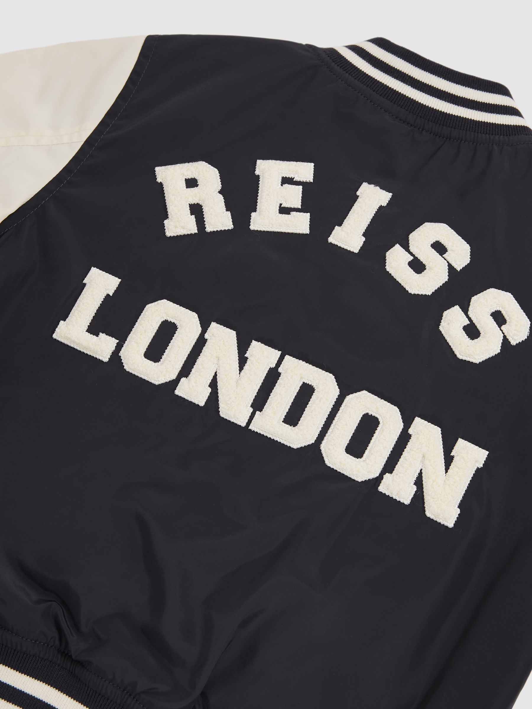 3-9 yrs Colour-Block Varsity Bomber Jacket in Navy/ Off White - Image 4 of 4