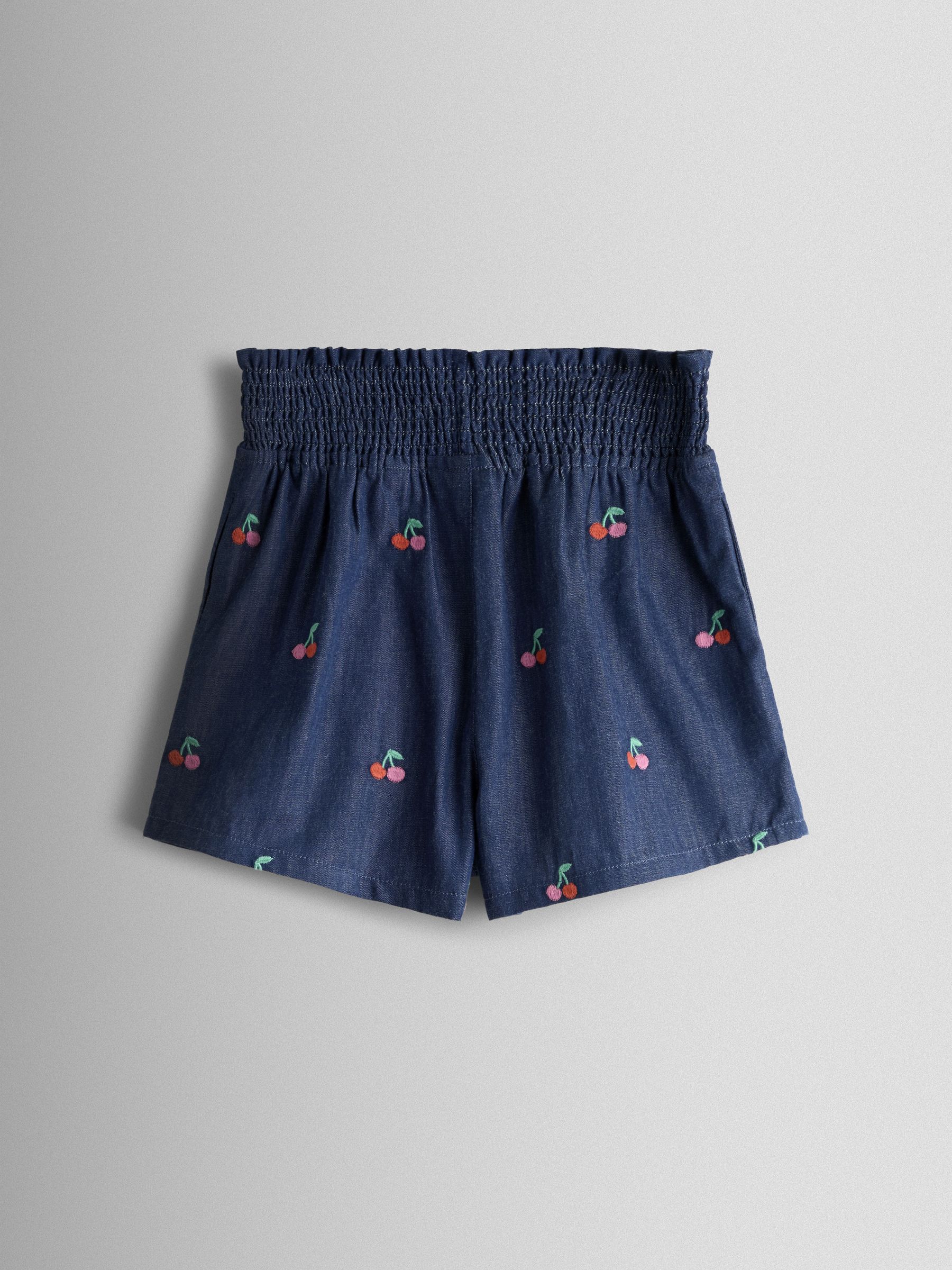 Blue Chambray Cherry Smocked Waistband Embroidered Shorts - Image 2 of 3 Blue Chambray Cherry Smocked Waistband Embroidered Shorts - Image 2 of 3