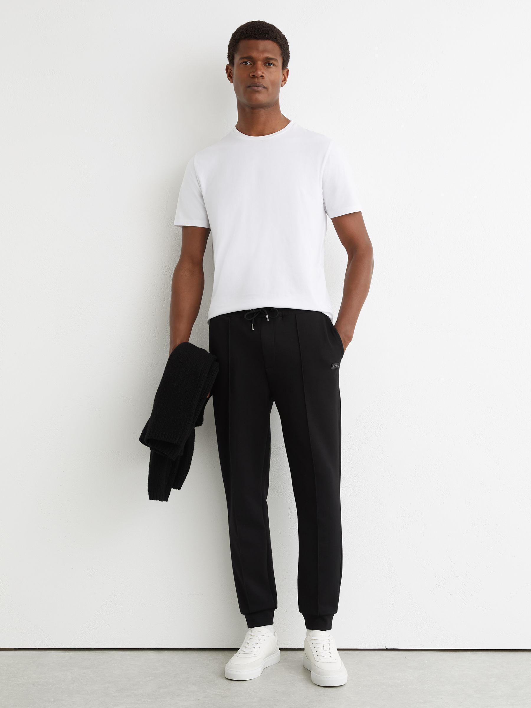 Premium Interlock Cuffed Logo Joggers in Black - image 2