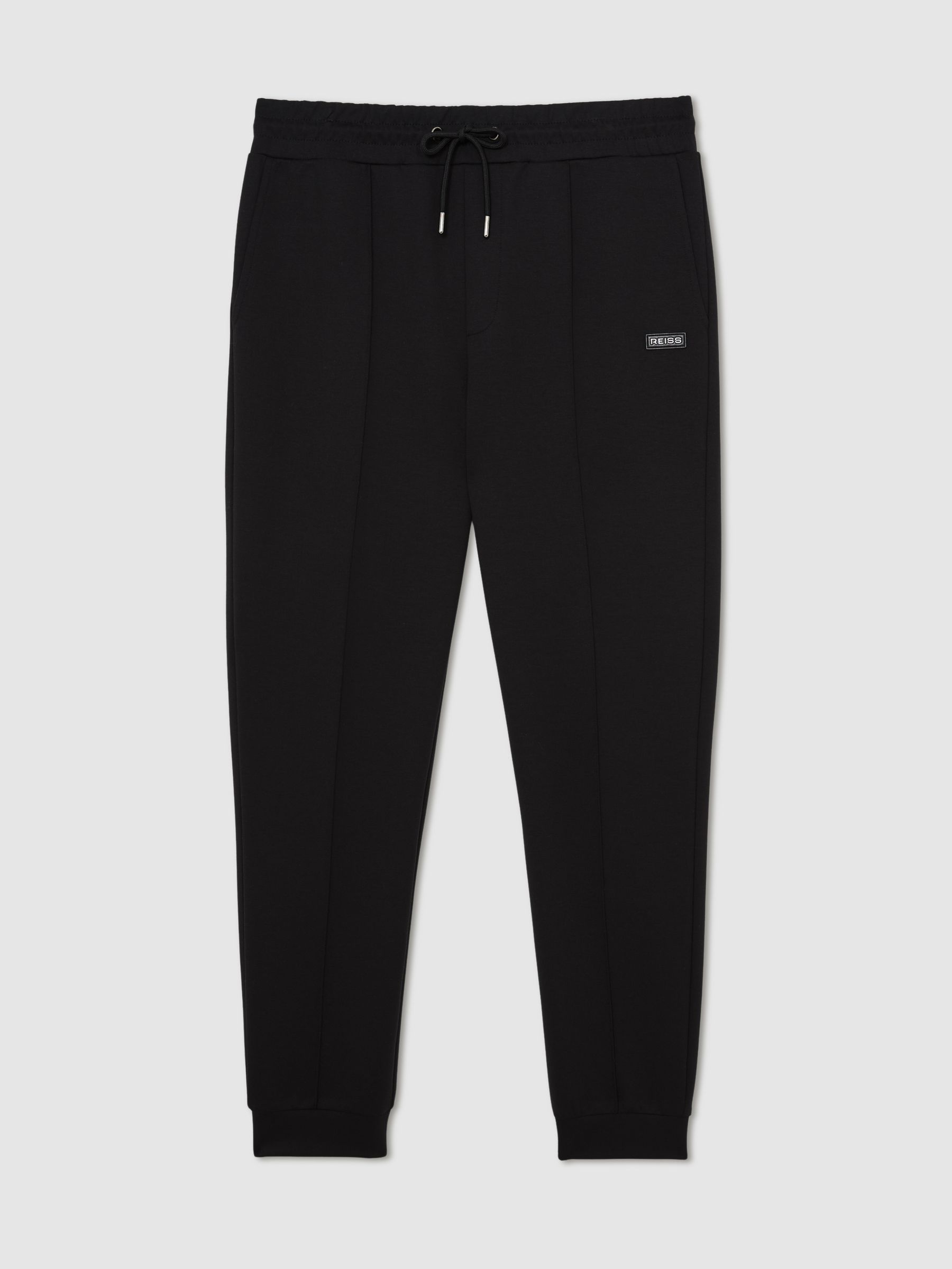 Premium Interlock Cuffed Logo Joggers in Black - image 1