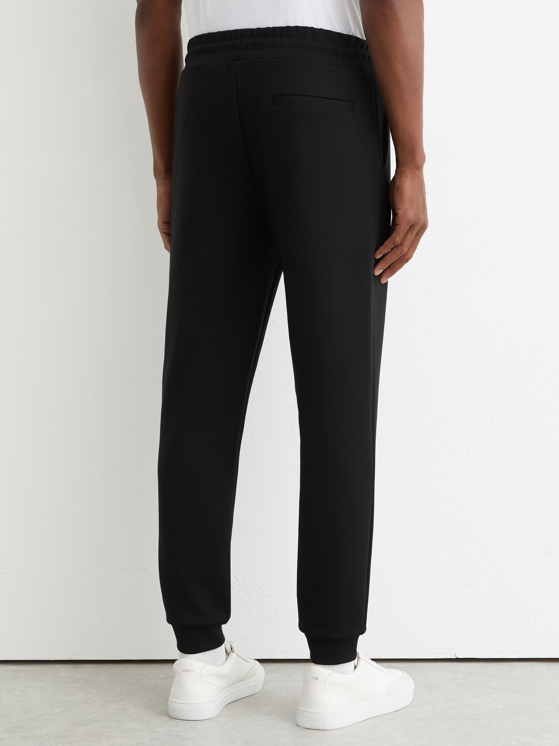 Premium Interlock Cuffed Logo Joggers in Black - image 3