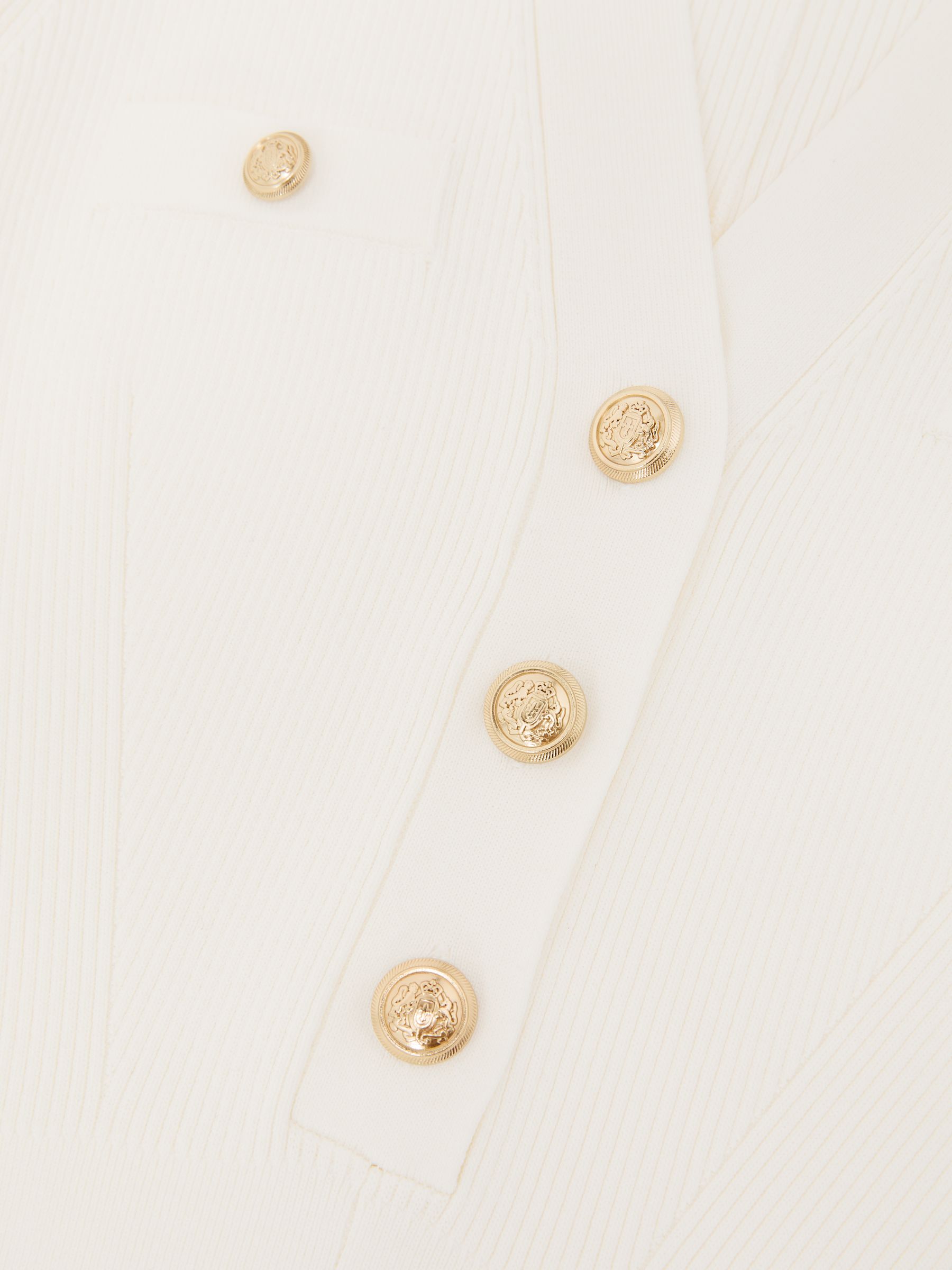 Knitted Button-Detail Mini Dress in Ivory - image 3