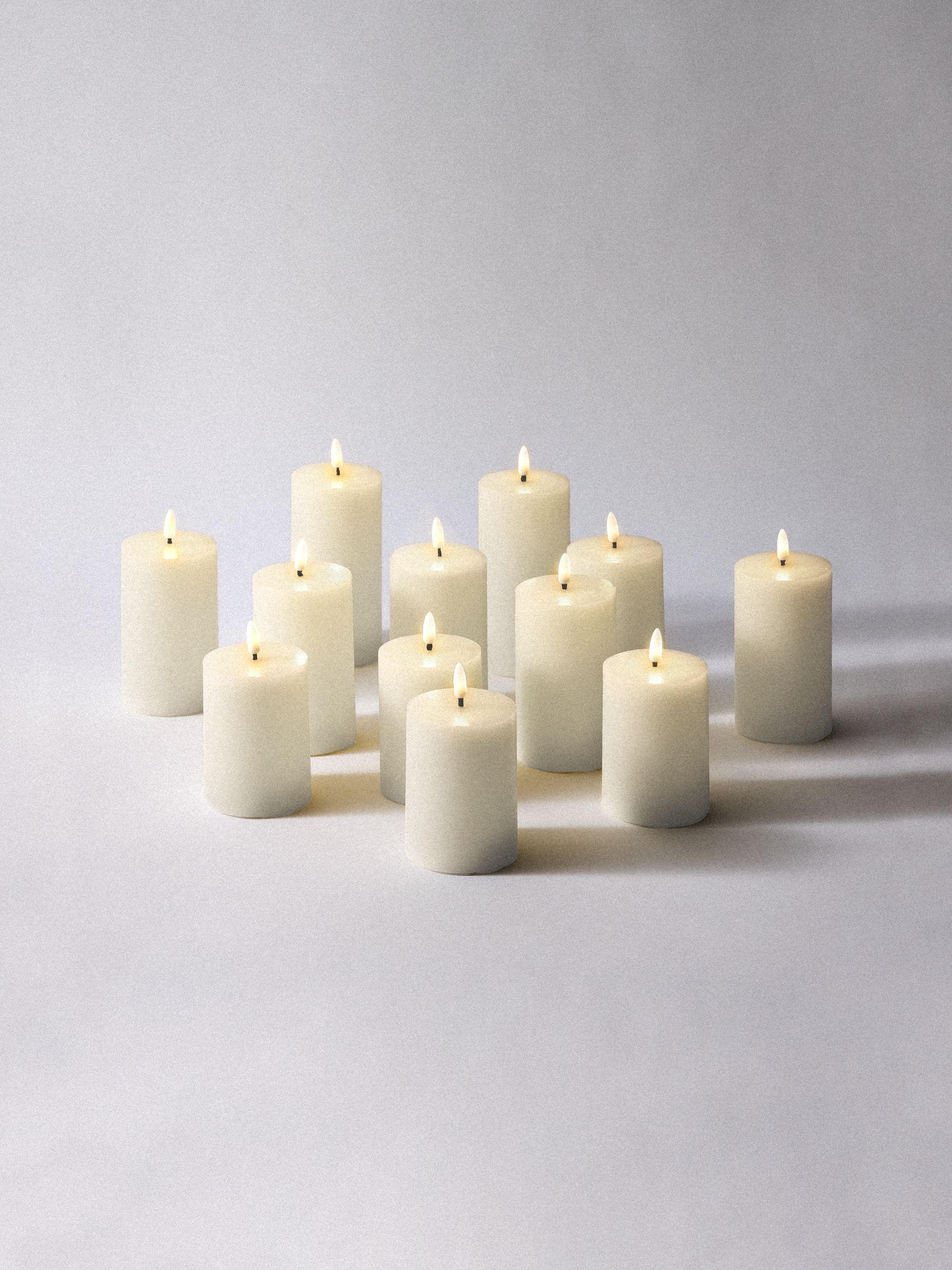 The Set 12 Pack Cream Real Wax LED Candles - Image 4 of 5