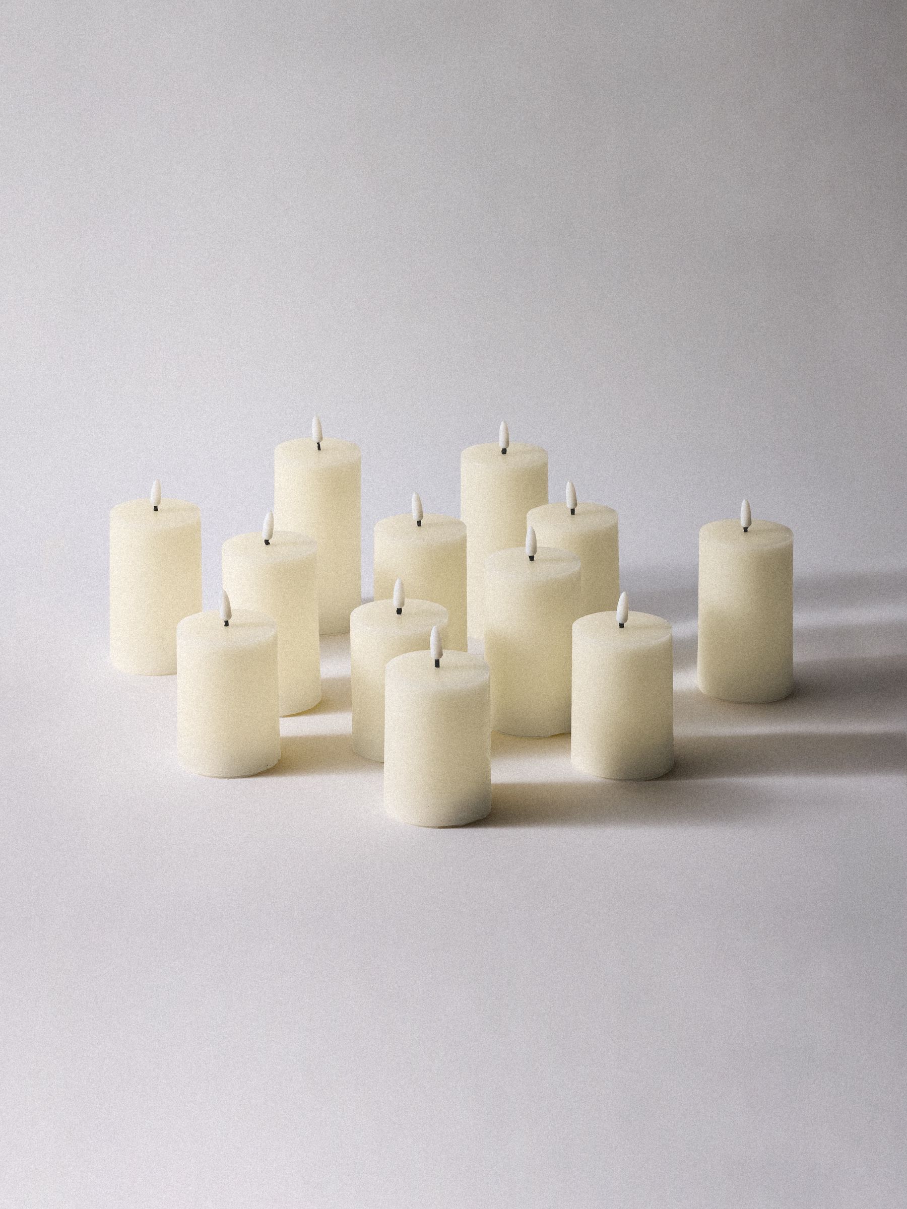 The Set 12 Pack Cream Real Wax LED Candles - Image 5 of 5