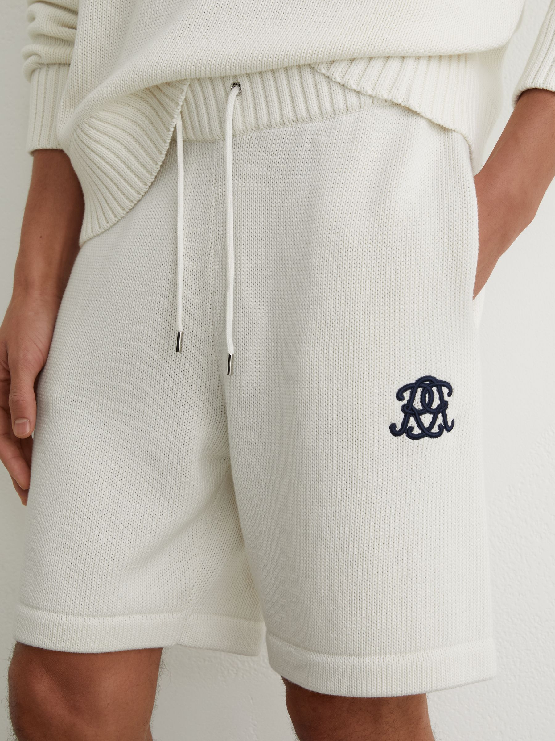Monogram-Embroidered Relaxed Knit Shorts in Off White - Image 1 of 6