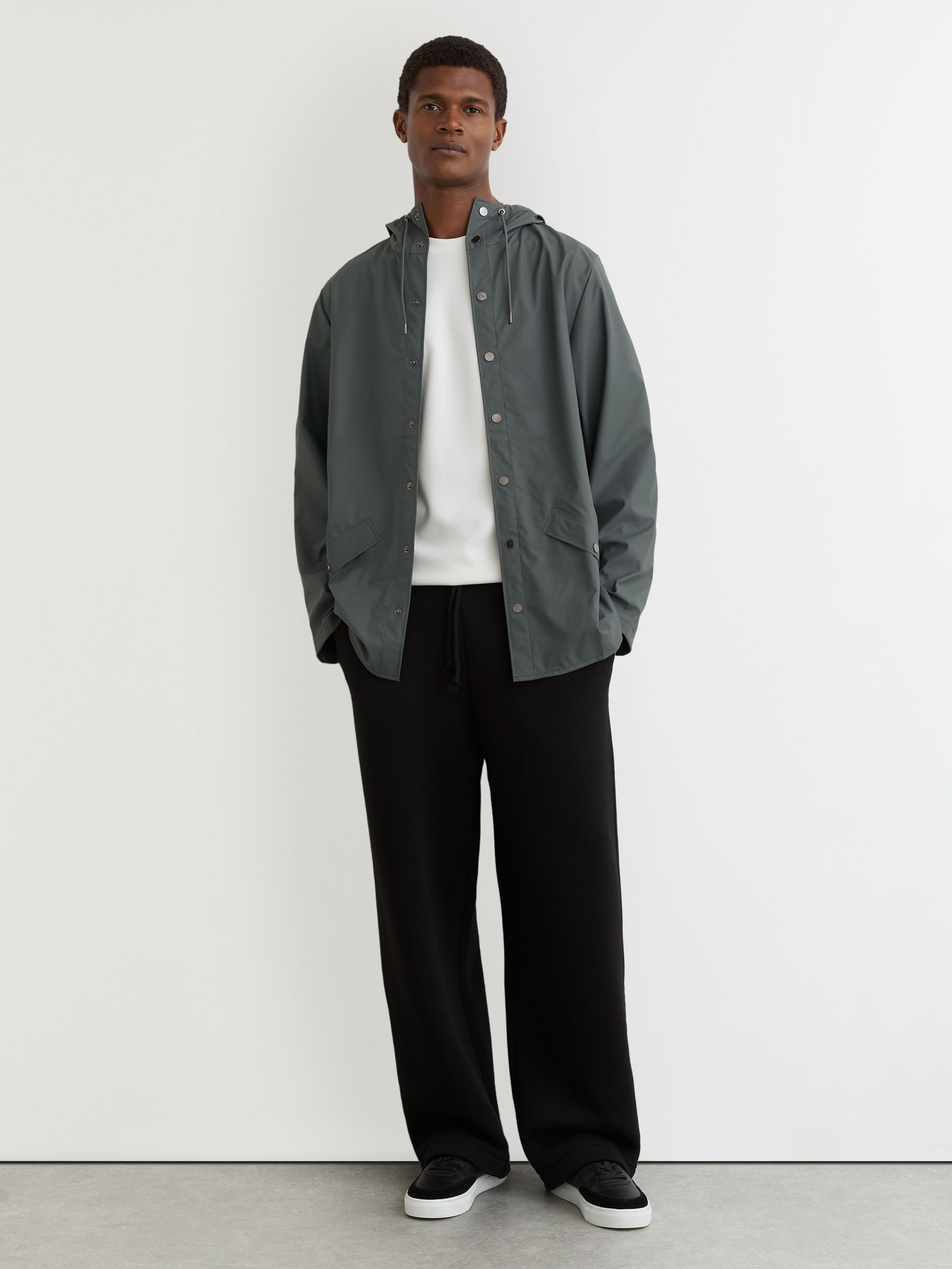 Rains Waterproof Hooded Rain Jacket in Lagoon - Image 1 of 5