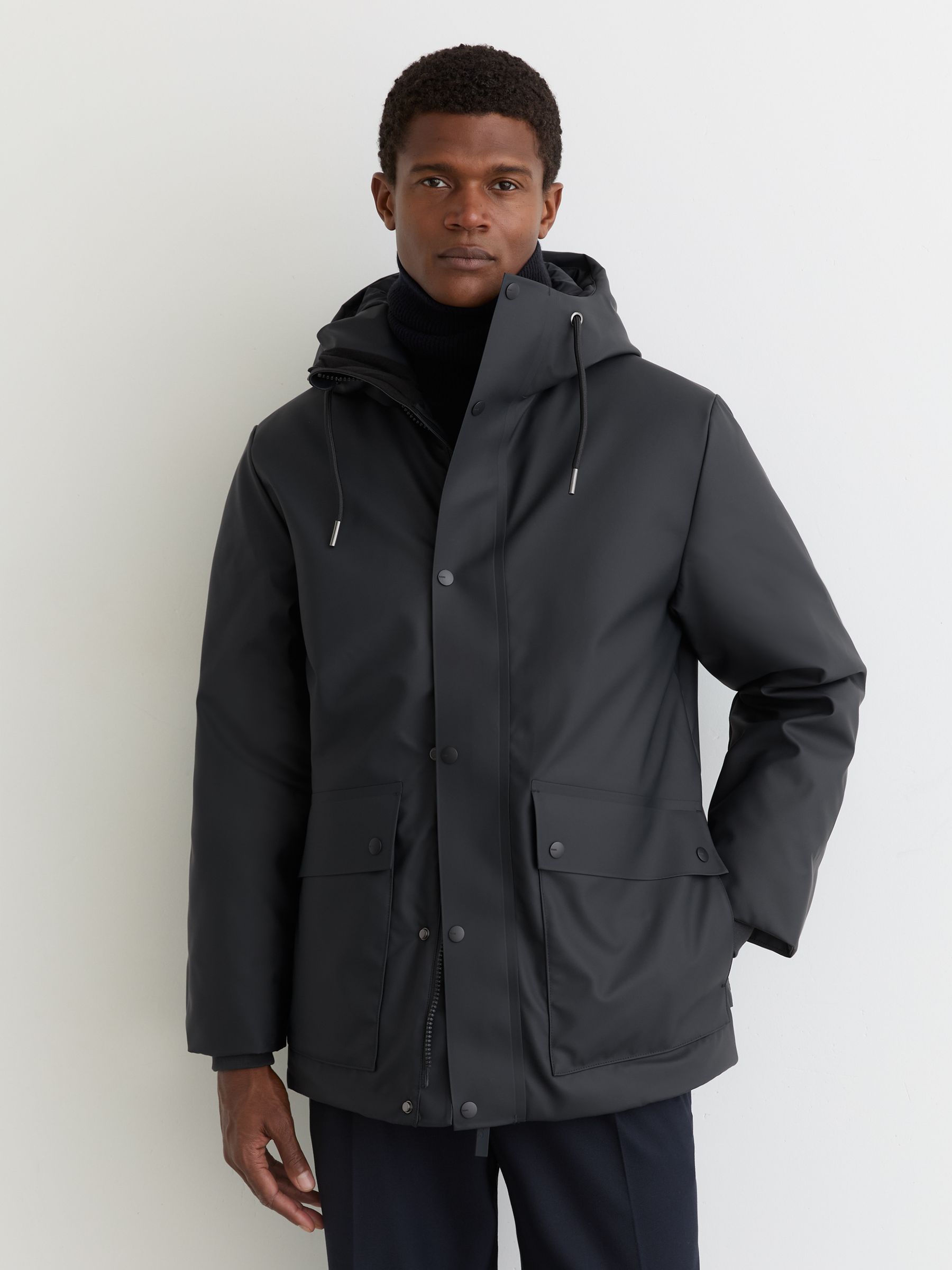 Rains Short Hooded Parka Coat in Navy - Image 1 of 5 Rains Short Hooded Parka Coat in Navy - Image 1 of 5