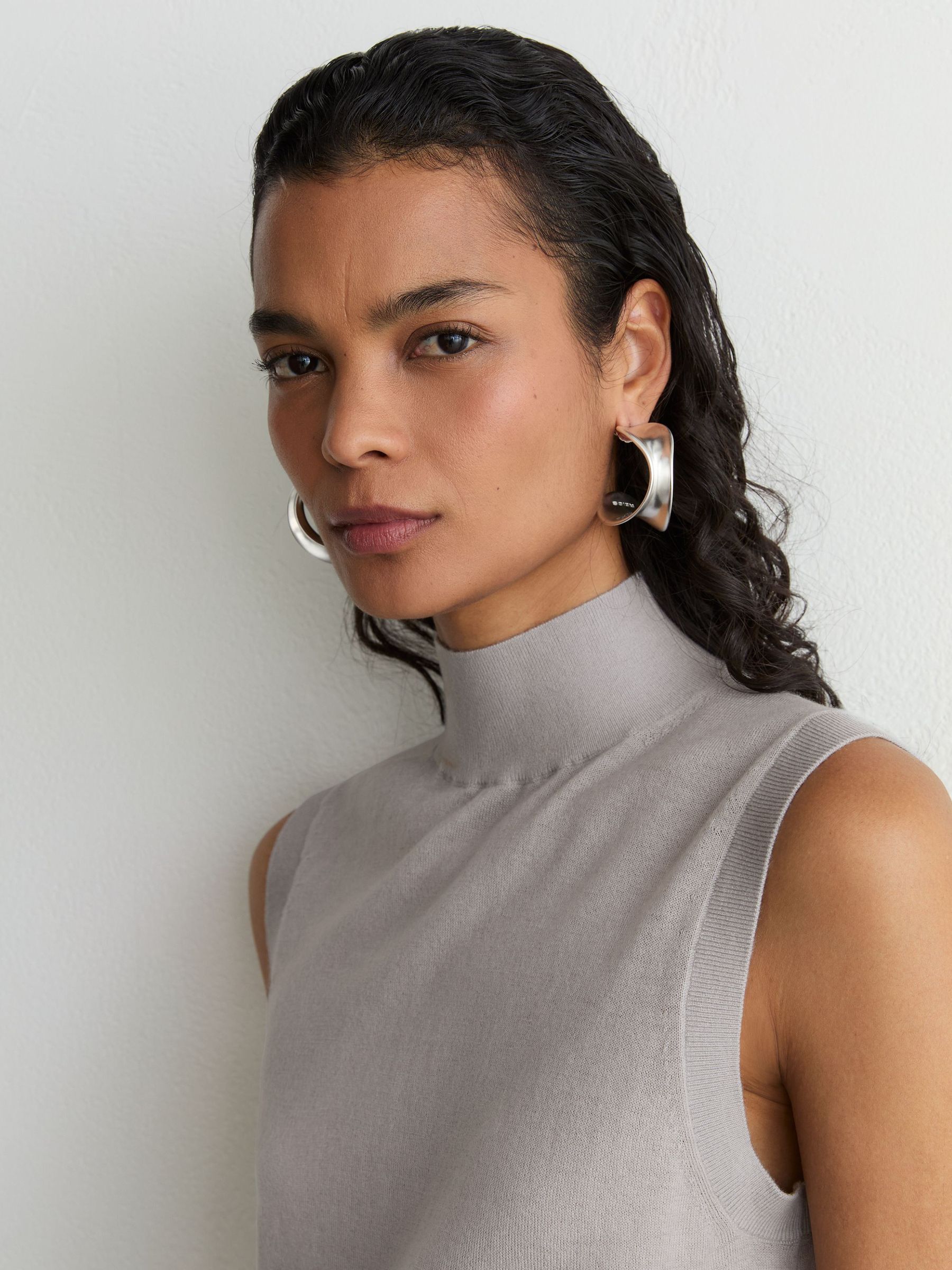 Merino Wool Funnel-Neck Sleeveless Top in Grey - Image 1 of 7 Merino Wool Funnel-Neck Sleeveless Top in Grey - Image 1 of 7