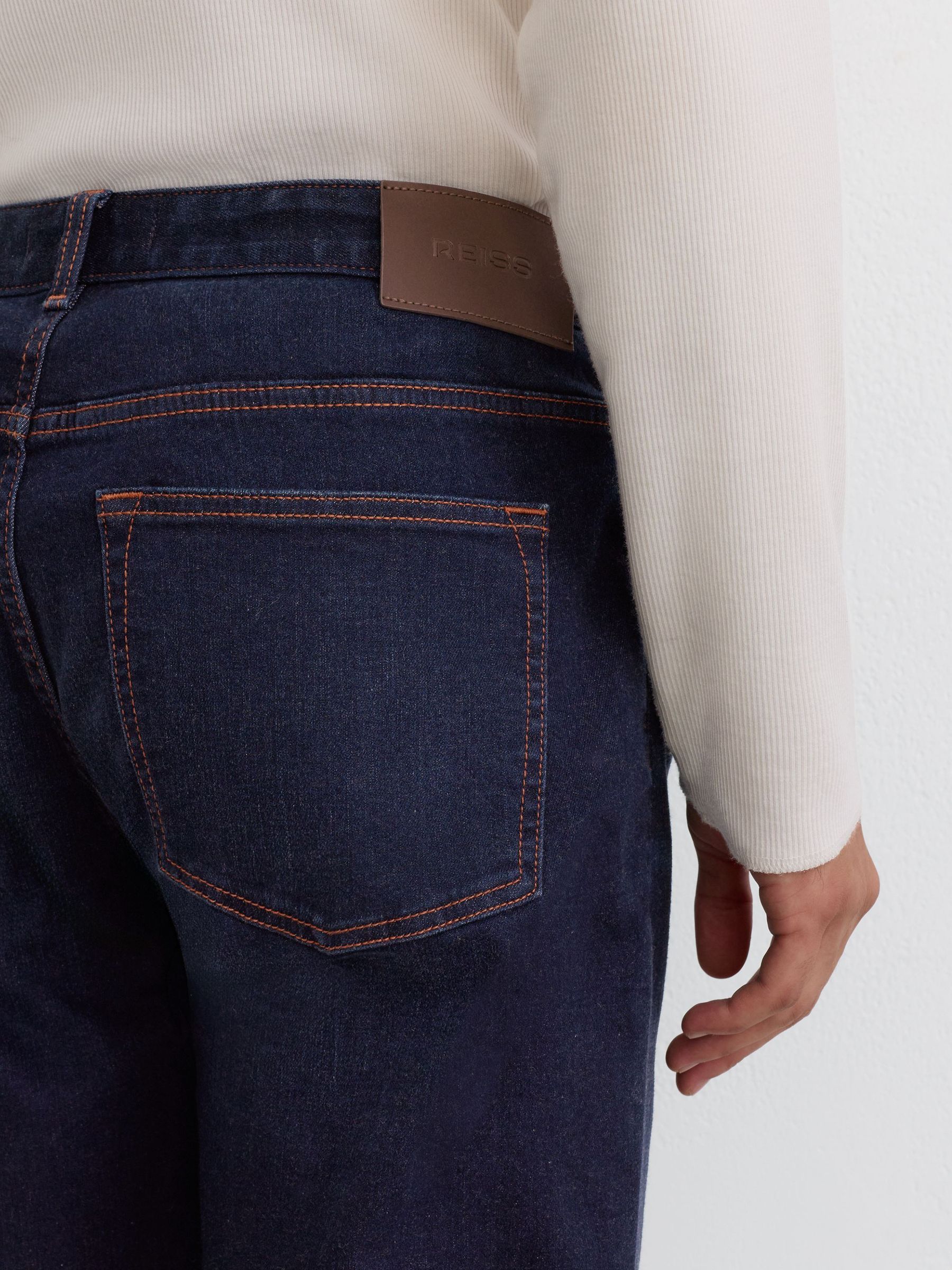 Tapered Slim-Fit Jeans in Washed Dark Indigo - Image 4 of 6