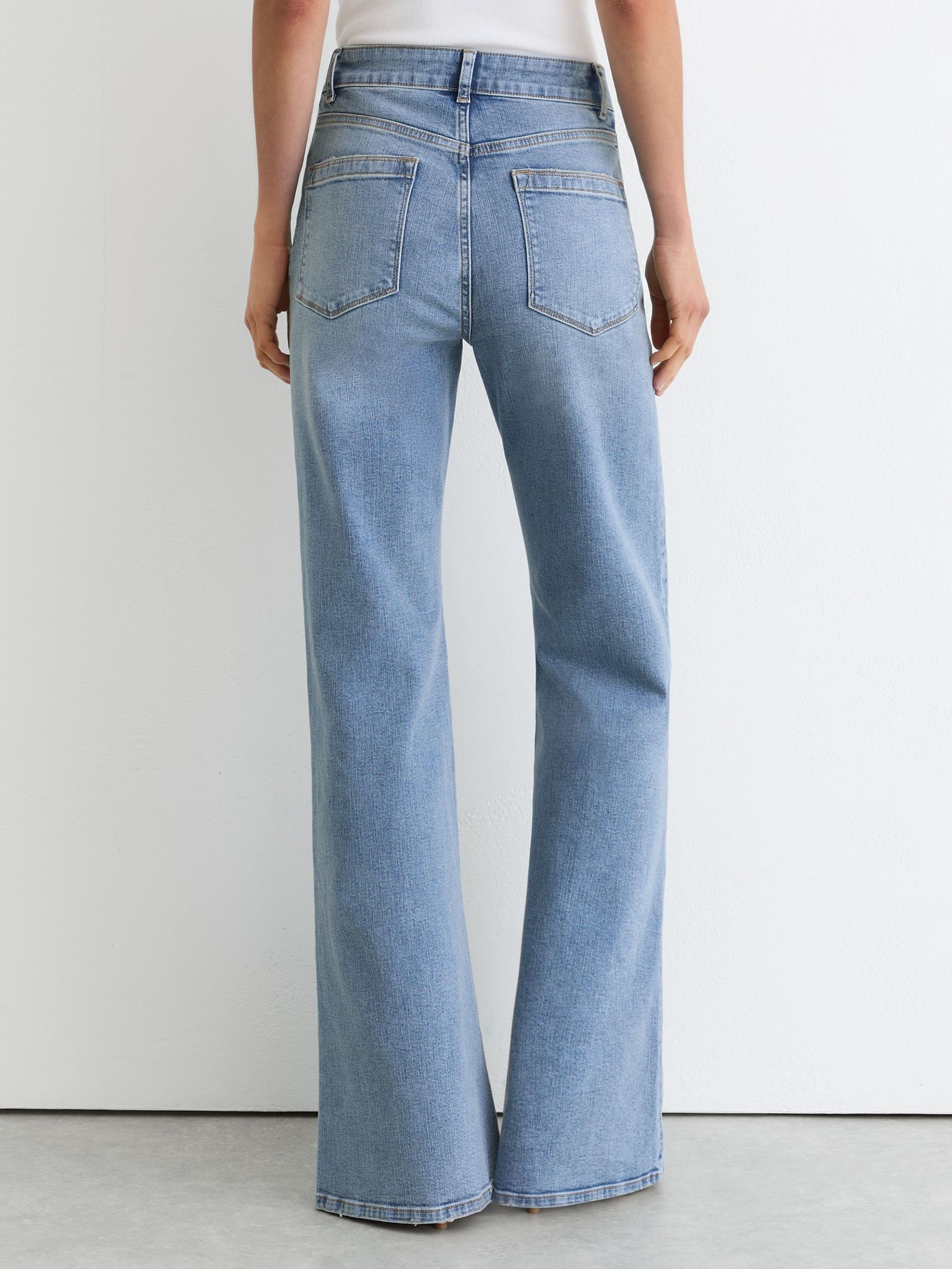 Petite Twin-Pocket Button Flared Jeans in Light Blue - Image 5 of 9