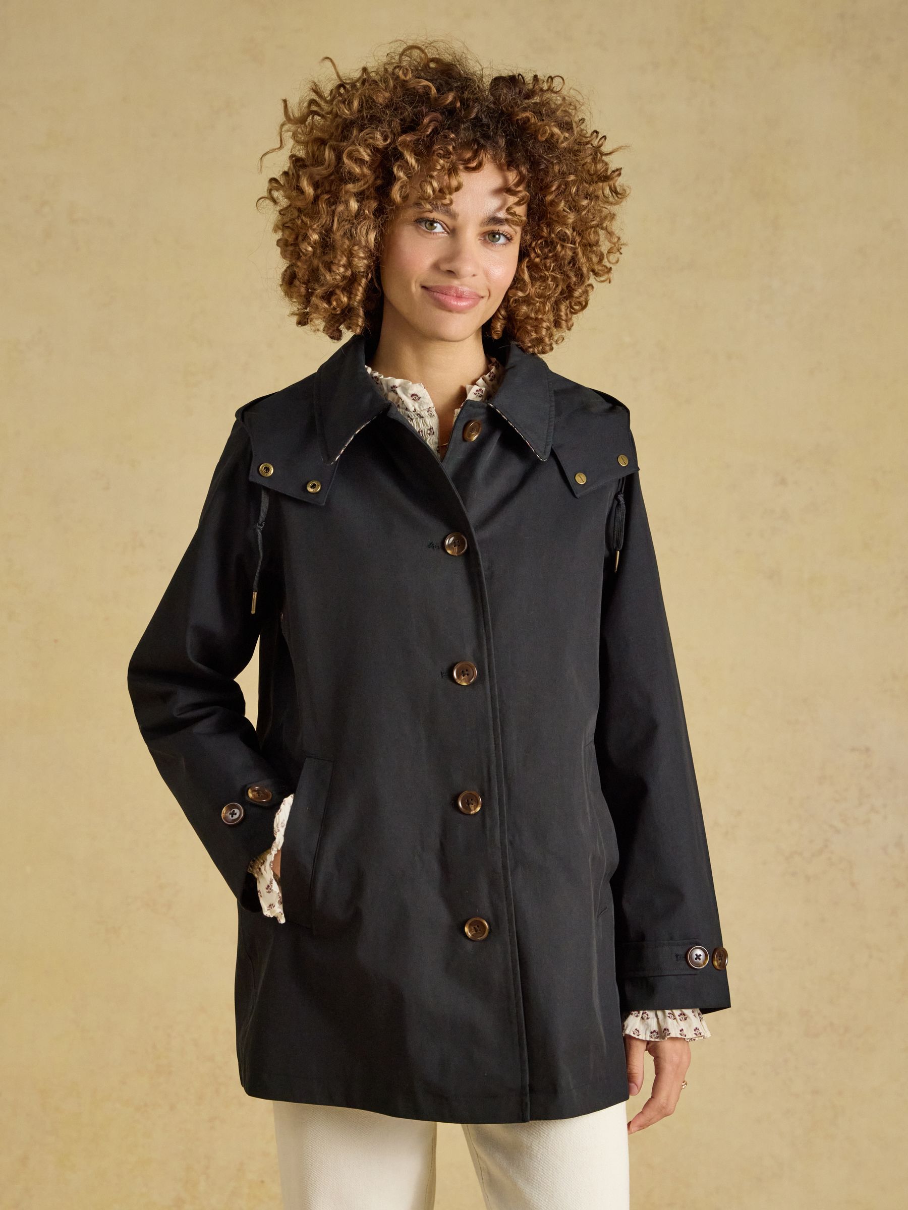 Rainmore Black Waterproof Button Through Raincoat - Image 1 of 12