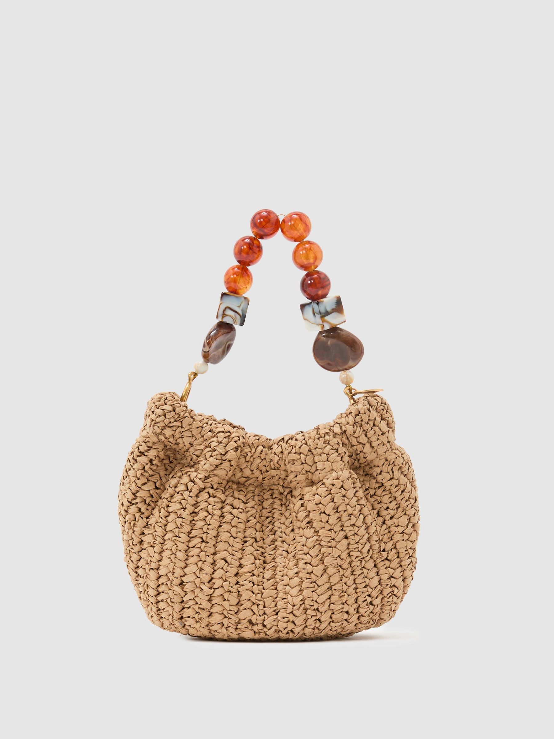 Raffia-Effect Beaded-Handle Pouch Bag in Natural - image 1