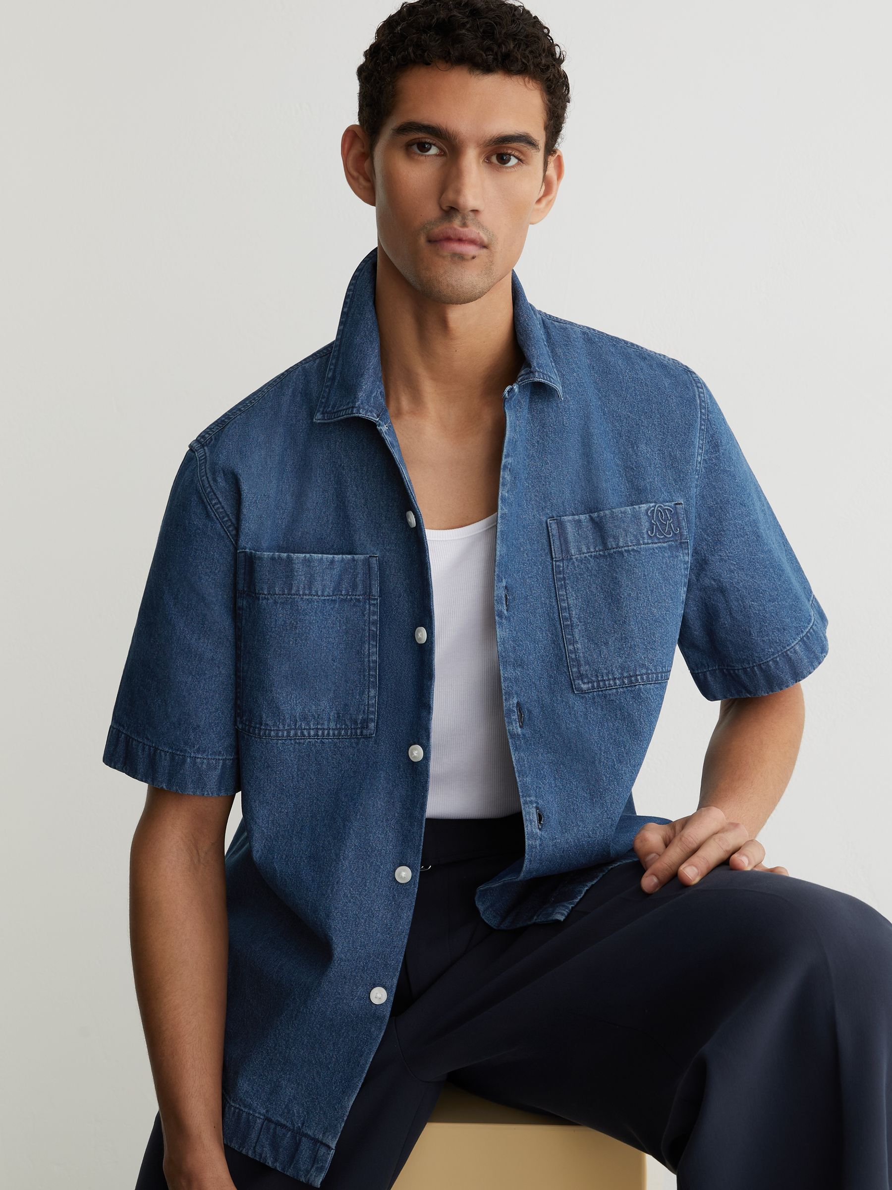 Monogram-Embossed Relaxed Denim Shirt in Mid Blue - Image 1 of 8