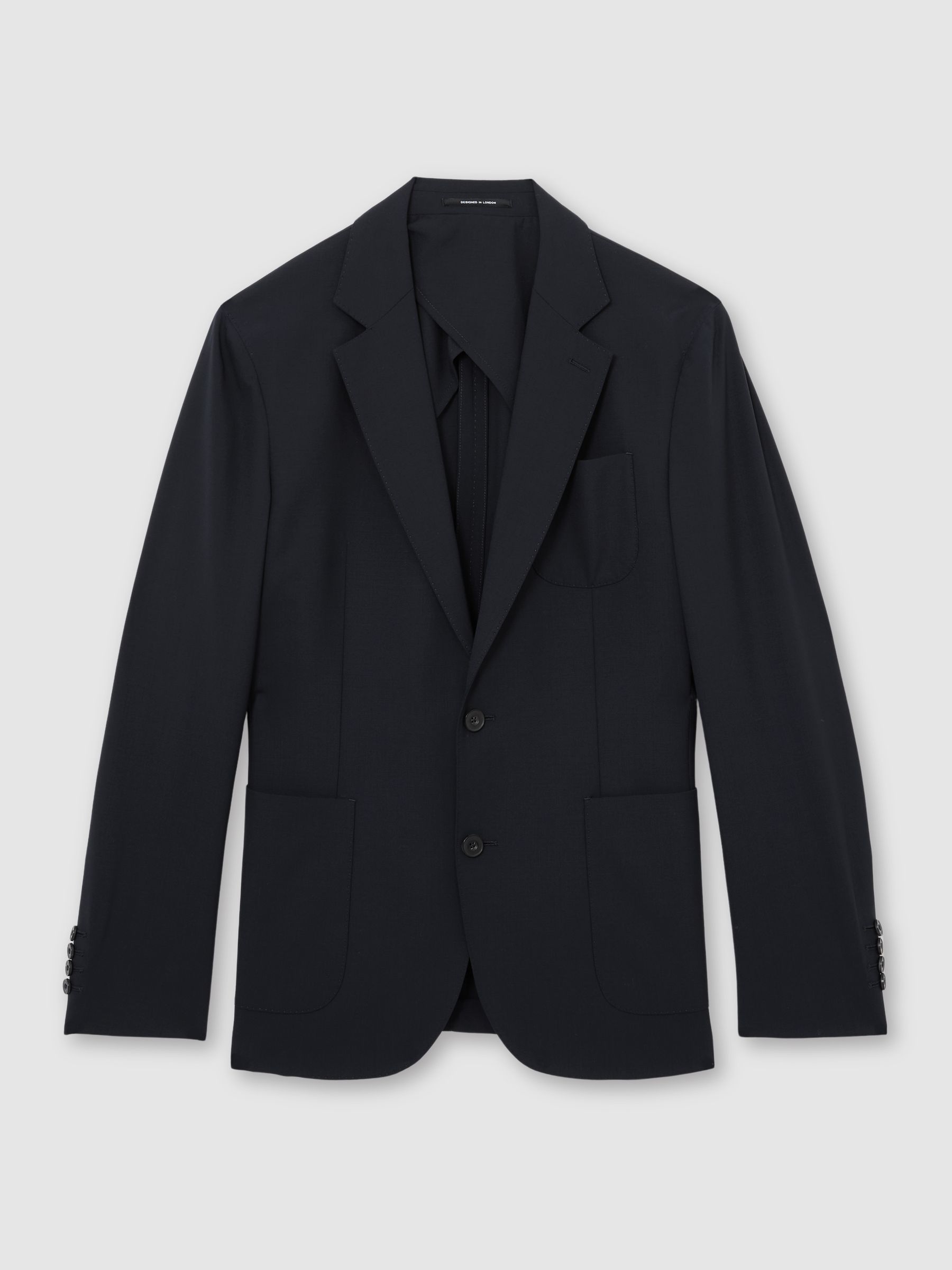 Tailored Fit Wool Single-Breasted Travel Suit Blazer in Navy - image 1