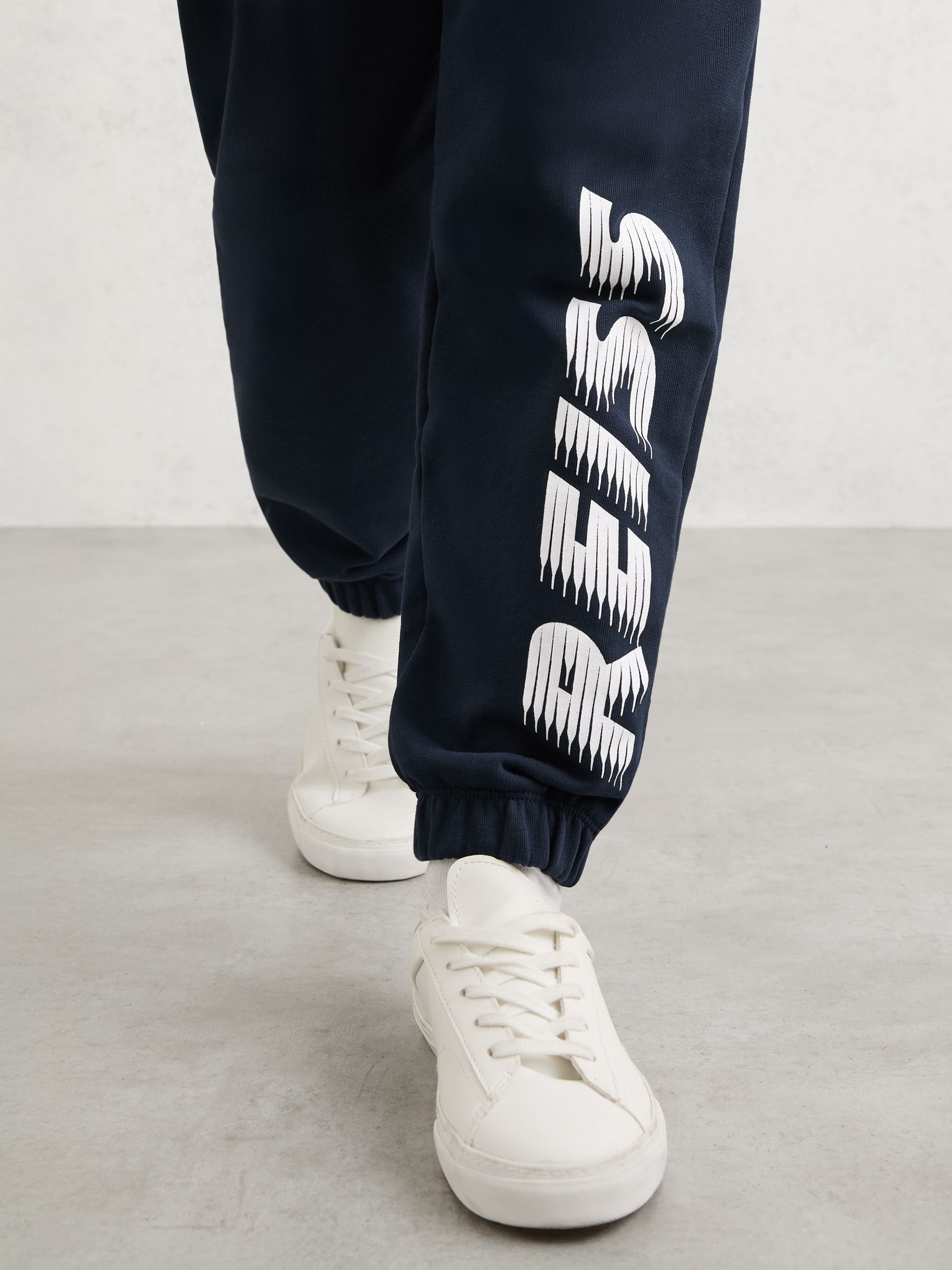 Cotton Logo-Print Cuffed Joggers in Navy - Image 4 of 5