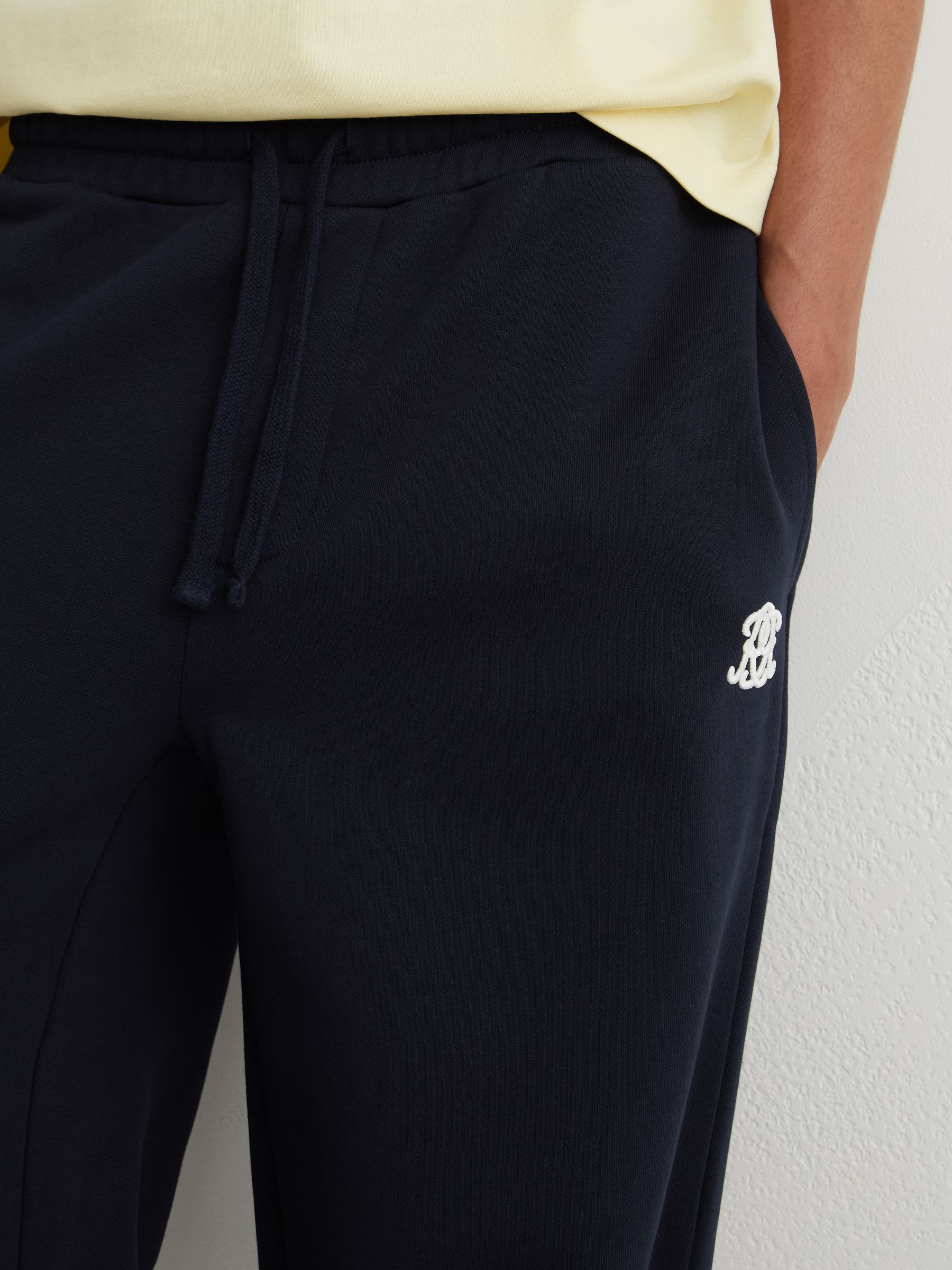 Monogram-Embroidered Relaxed Joggers in Navy - Image 4 of 6