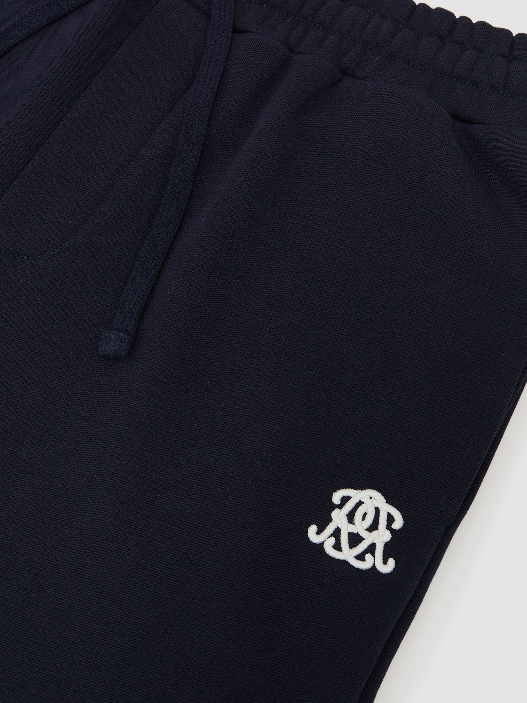 Monogram-Embroidered Relaxed Joggers in Navy - Image 6 of 6