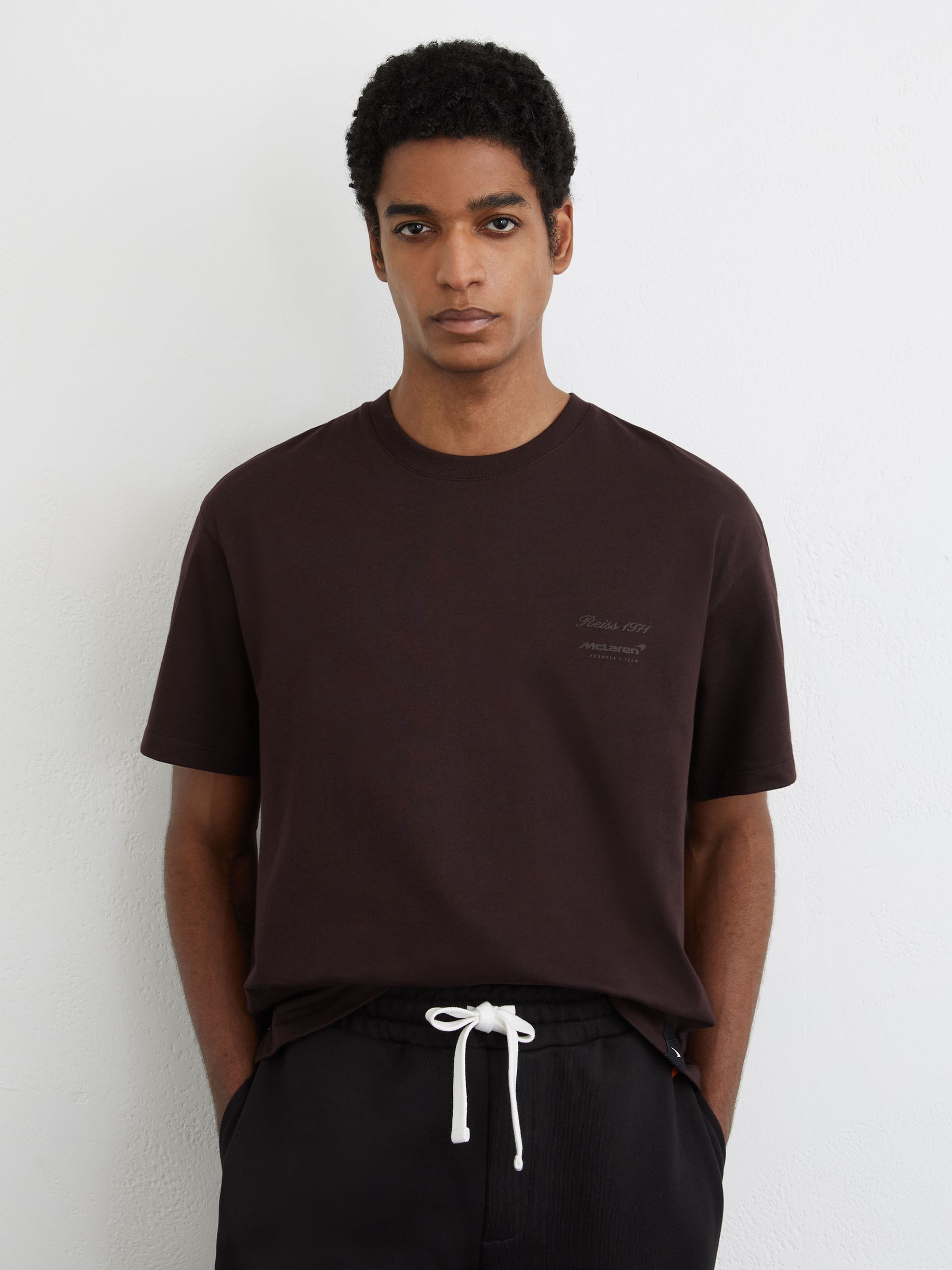 McLaren Racing Motorsport Relaxed T-Shirt Unisex-Fit in Chocolate Brown - Image 1 of 9