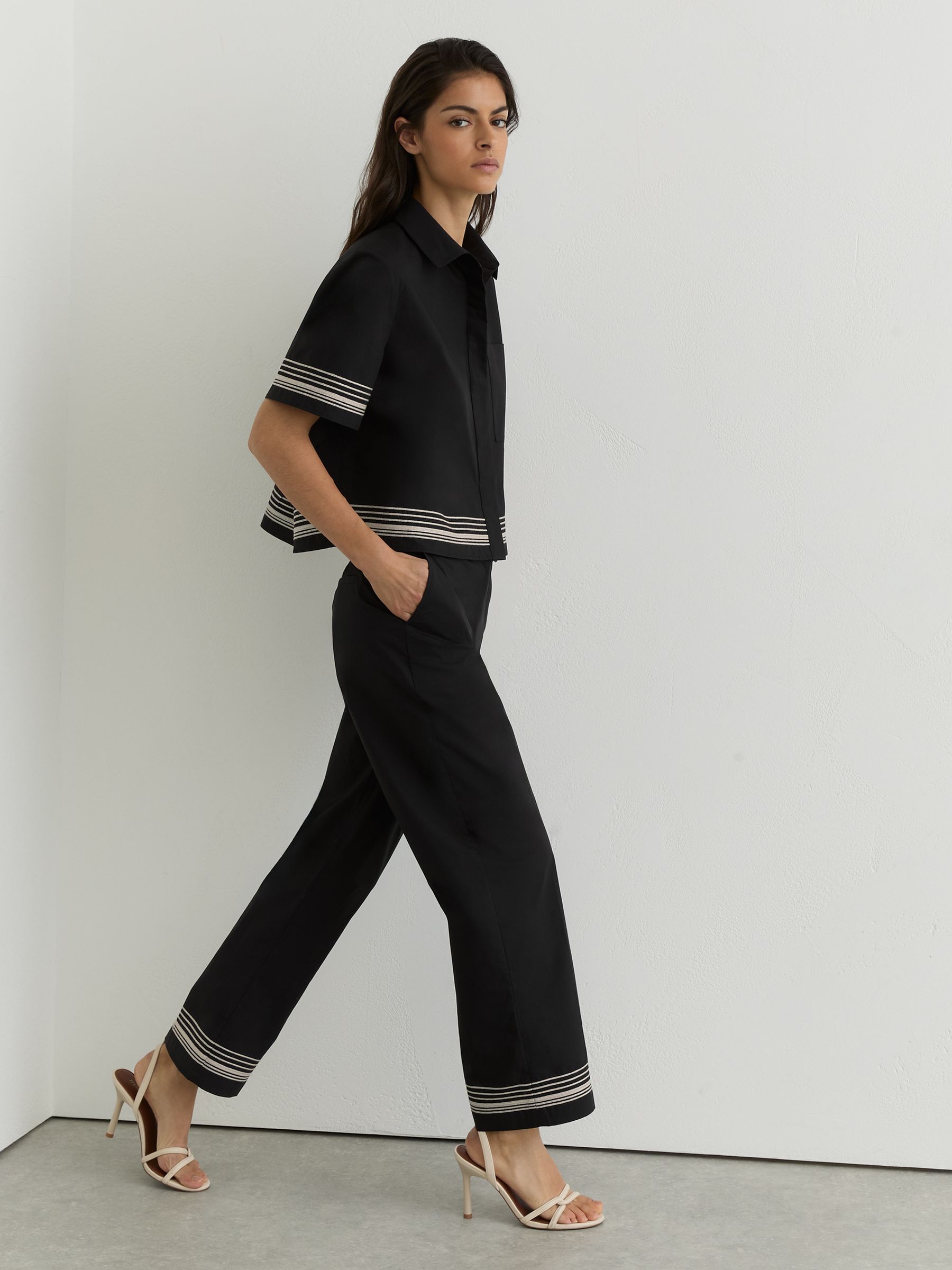 Cotton Stripe-Detail Tapered Trousers in Black/Ivory - image 3