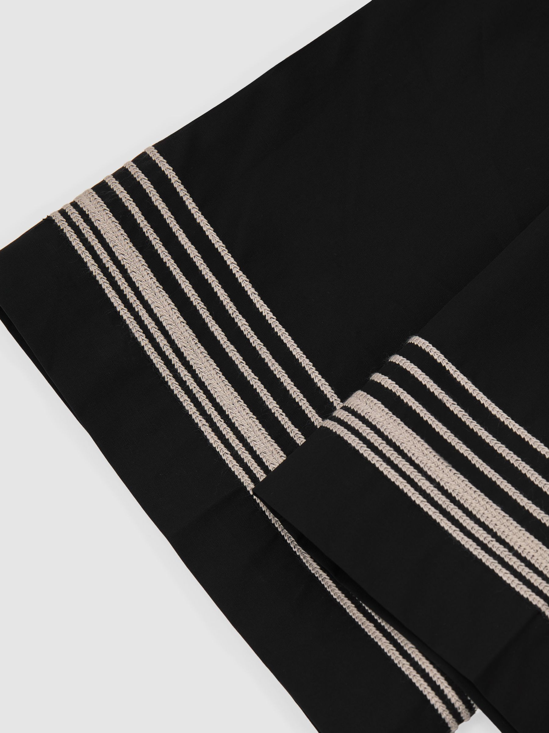 Cotton Stripe-Detail Tapered Trousers in Black/Ivory - image 2