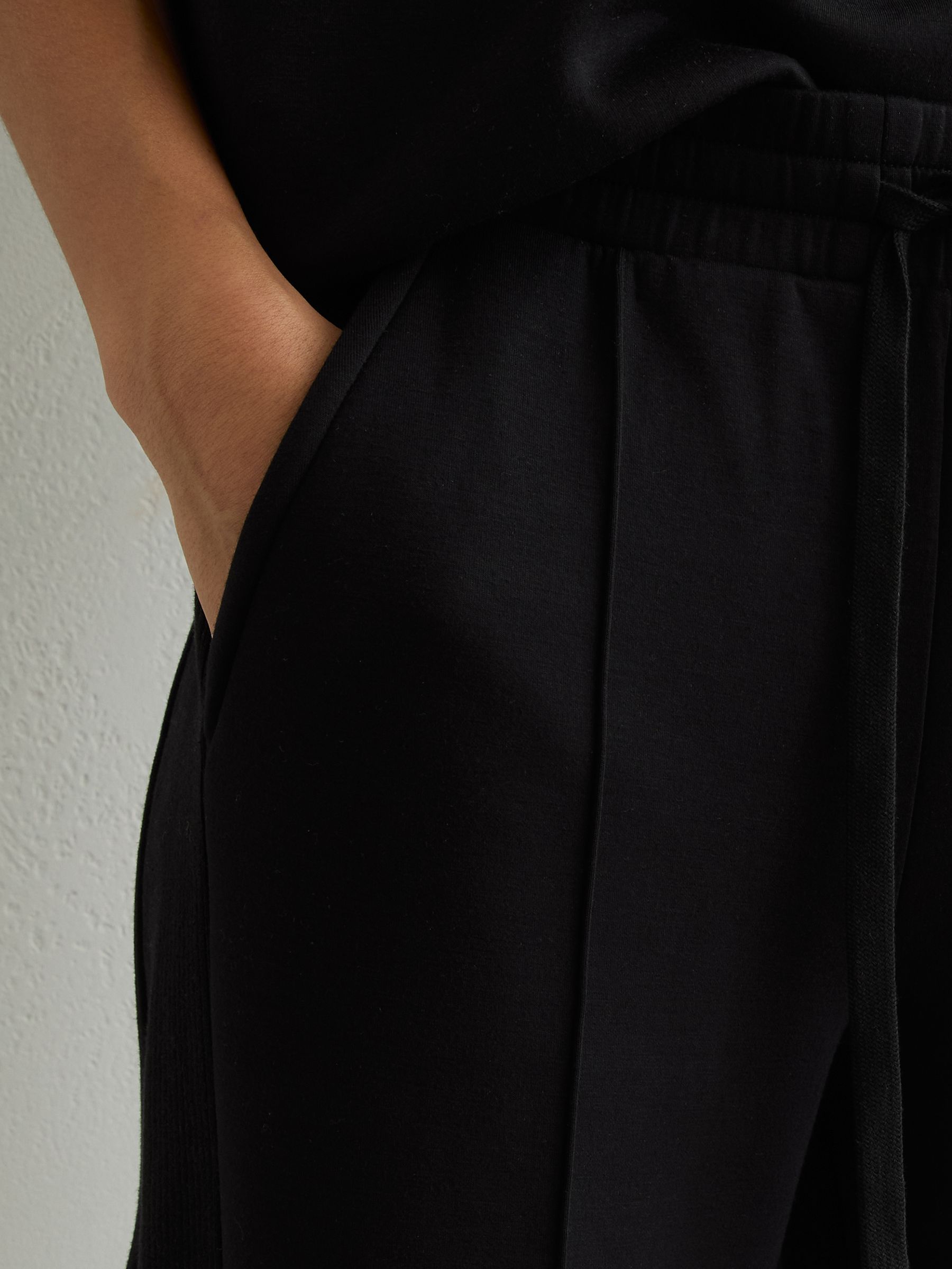 Premium Interlock Wide-Leg Joggers in Black - Image 4 of 7