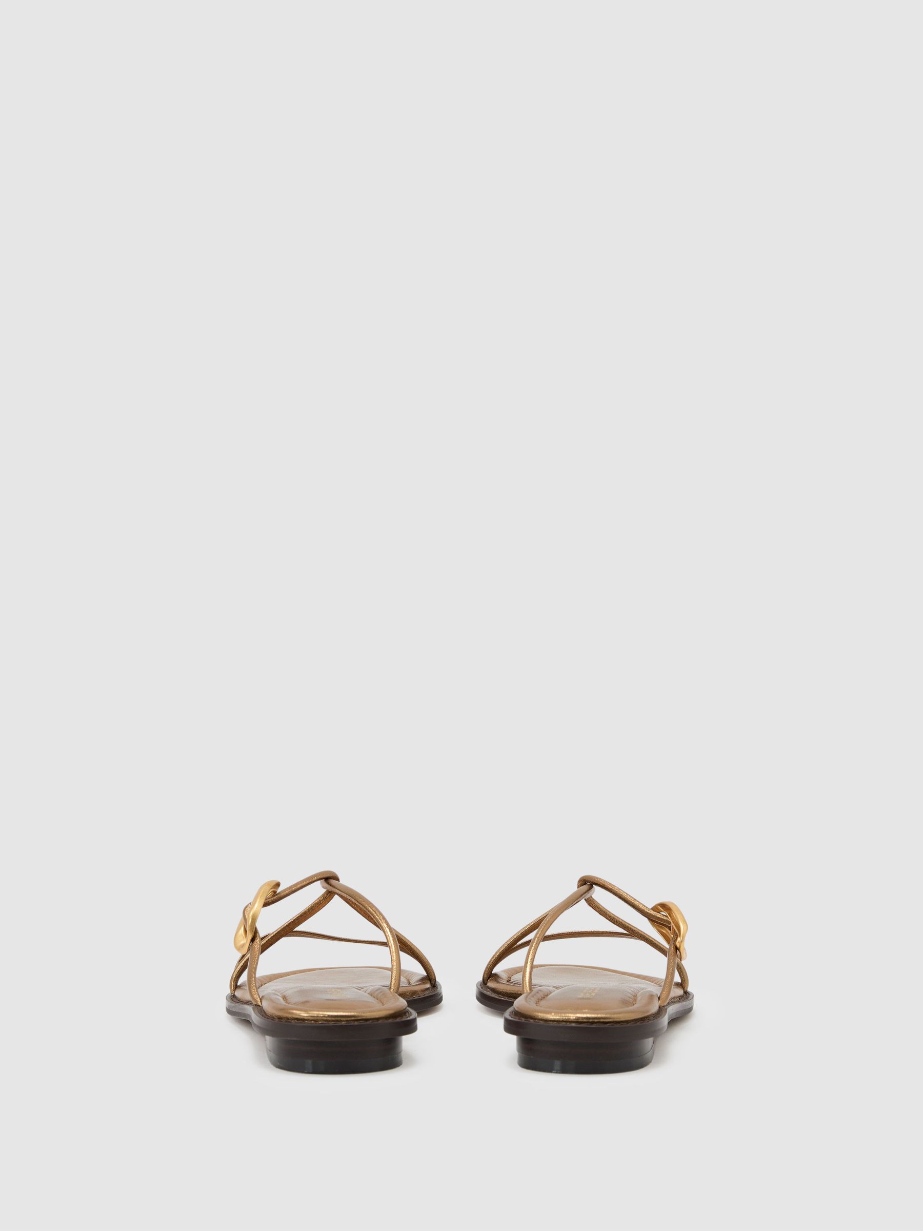 Leather Twist-Strap Flat Sandals in Dark Gold - image 3