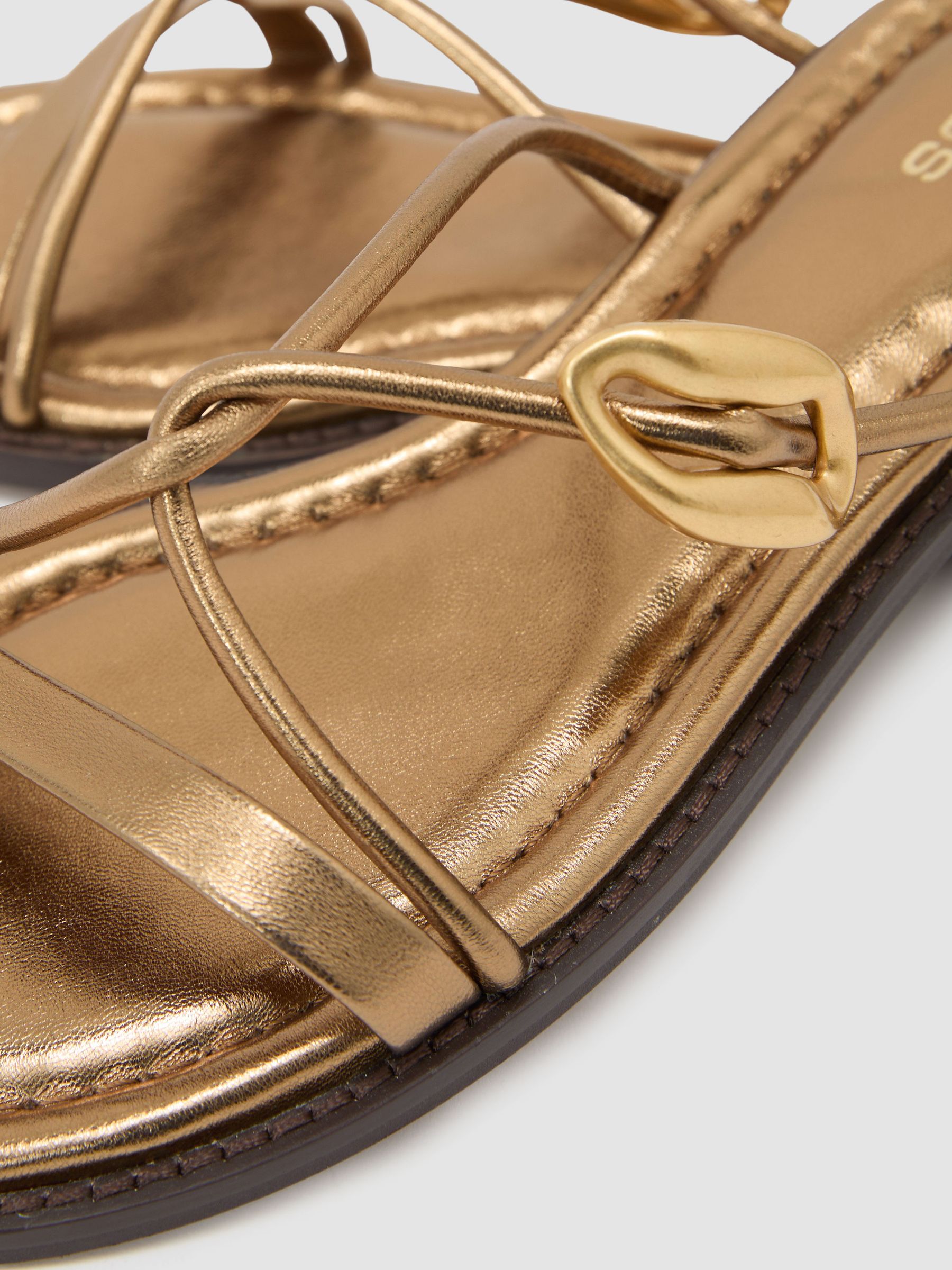 Leather Twist-Strap Flat Sandals in Dark Gold - image 2