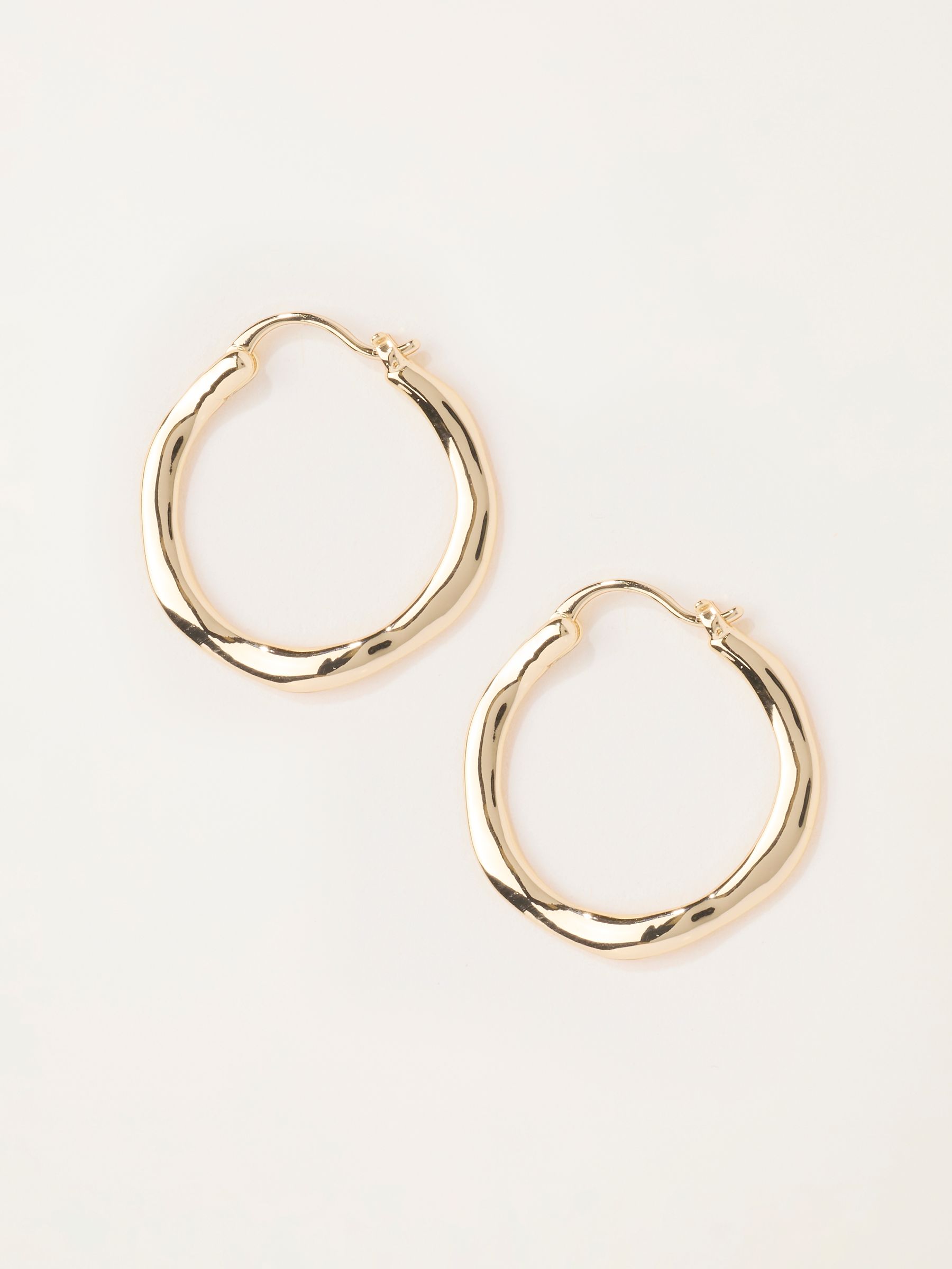 Gold Tone Hammered Hoop Earrings - Image 1 of 3