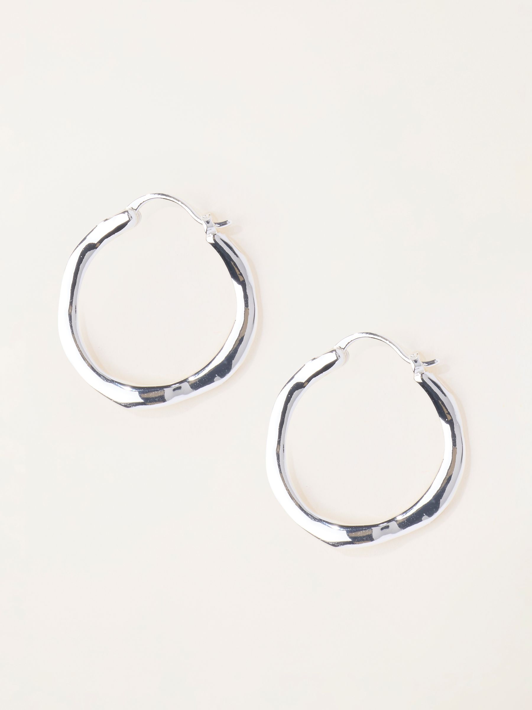 Silver Tone Hammered Hoop Earrings - Image 1 of 3