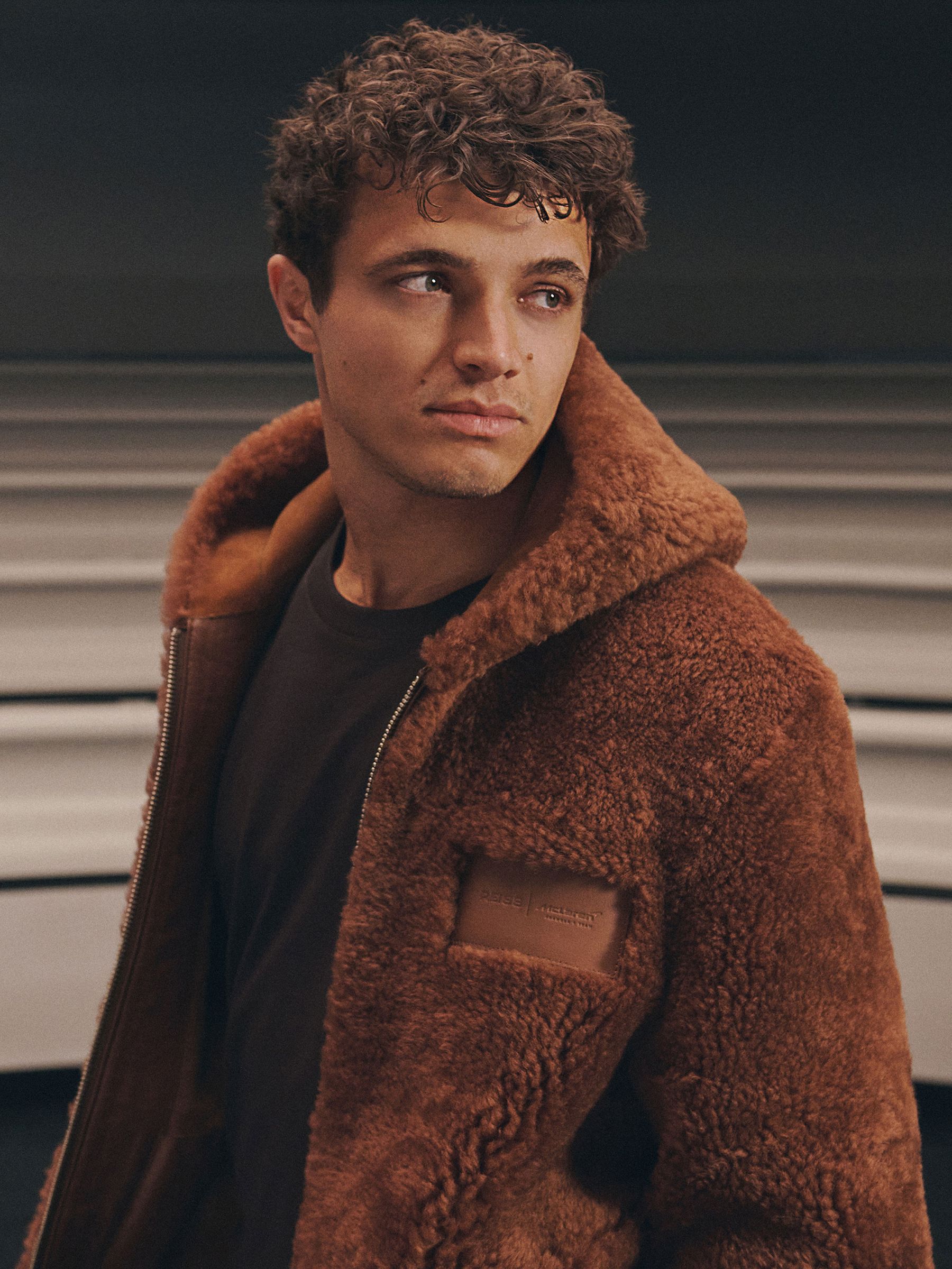 McLaren Racing Shearling Hooded Jacket Unisex-Fit in Brown - Image 1 of 9 McLaren Racing Shearling Hooded Jacket Unisex-Fit in Brown - Image 1 of 9