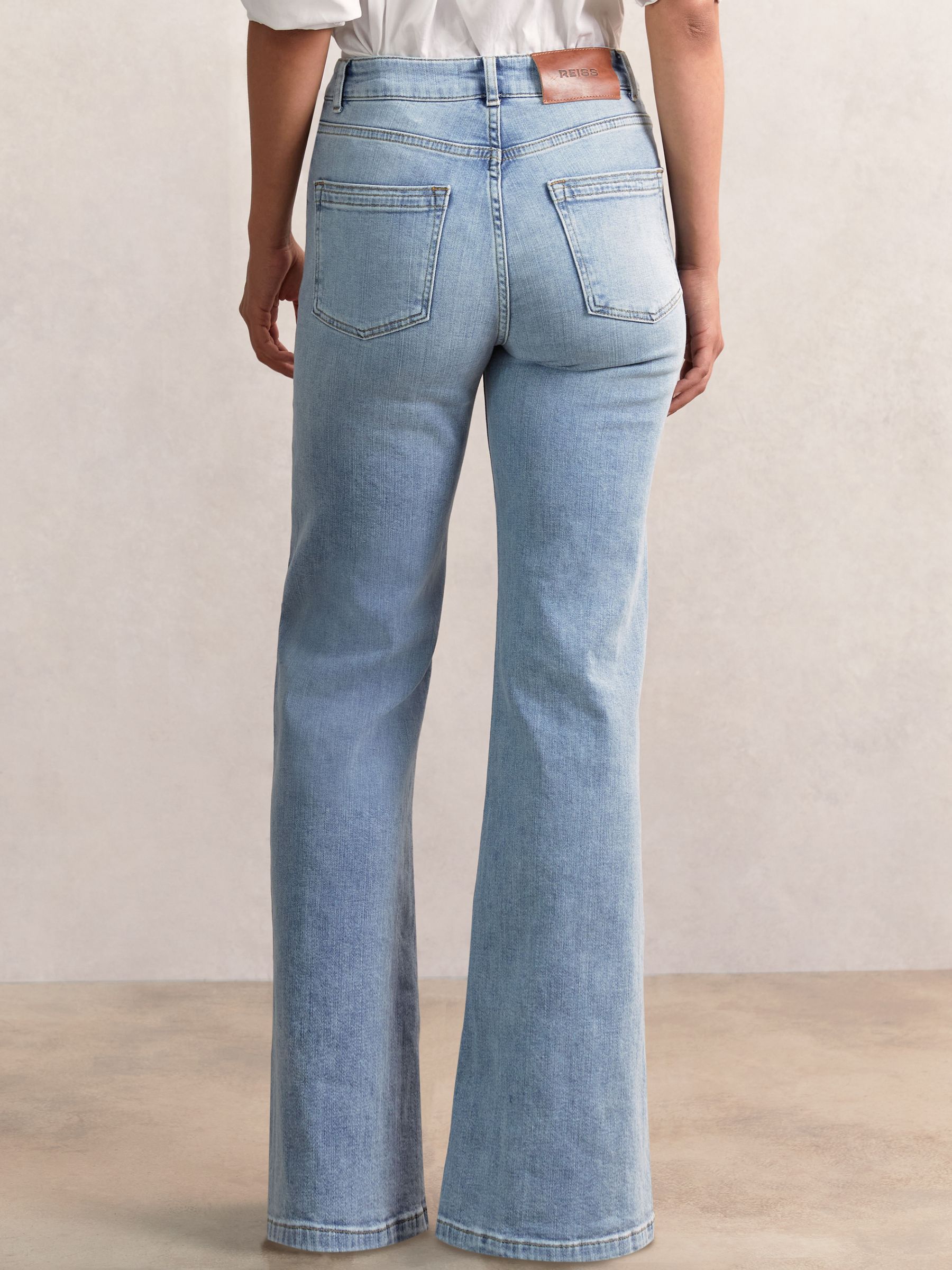 Petite Mid-Rise Flared Jeans in Light Blue - Image 4 of 6