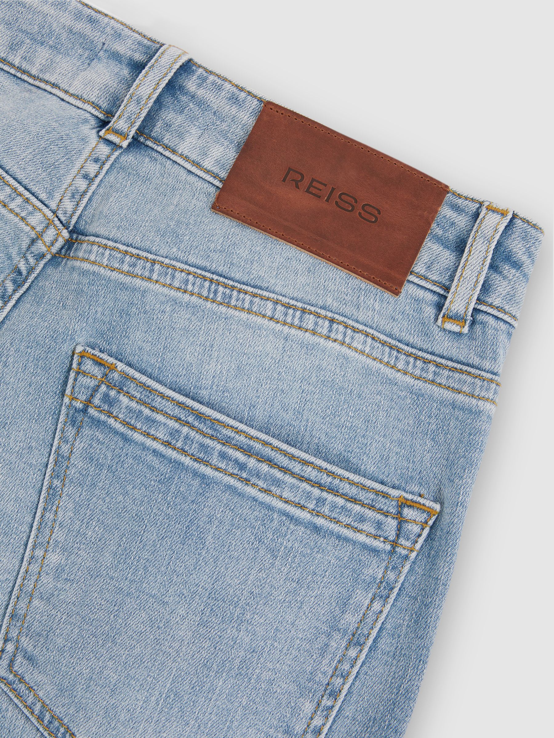 Petite Mid-Rise Flared Jeans in Light Blue - image 4