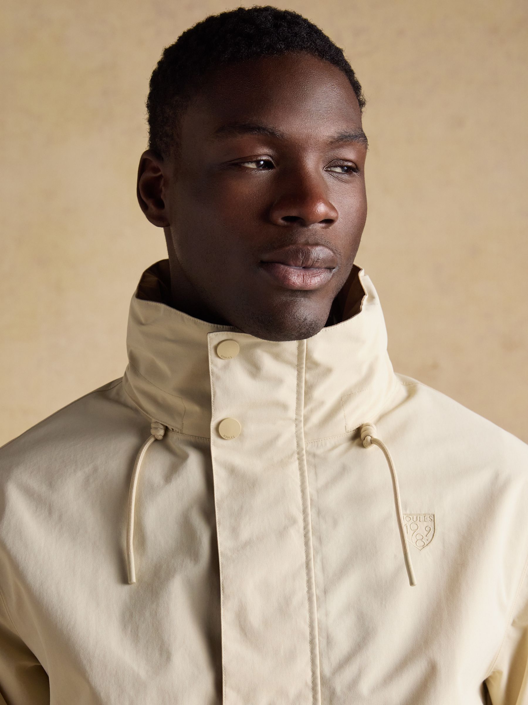 Quayside Stone Lightweight Waterproof Coat with Packable Hood - Image 10 of 16