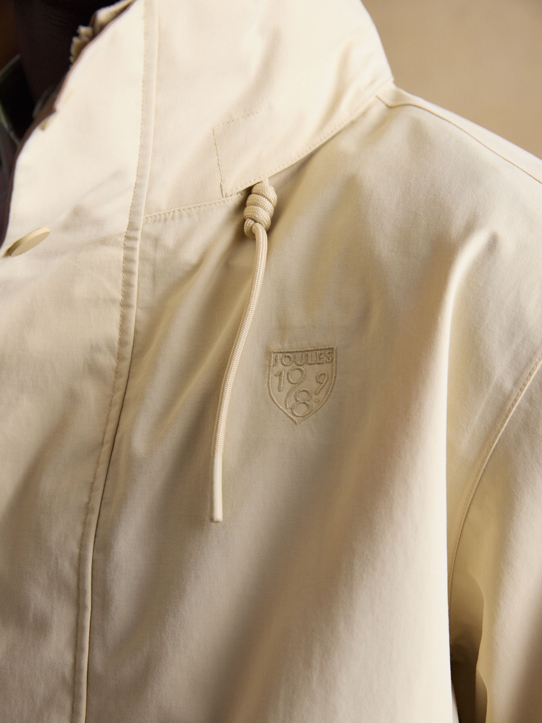 Quayside Stone Lightweight Waterproof Coat with Packable Hood - Image 13 of 16