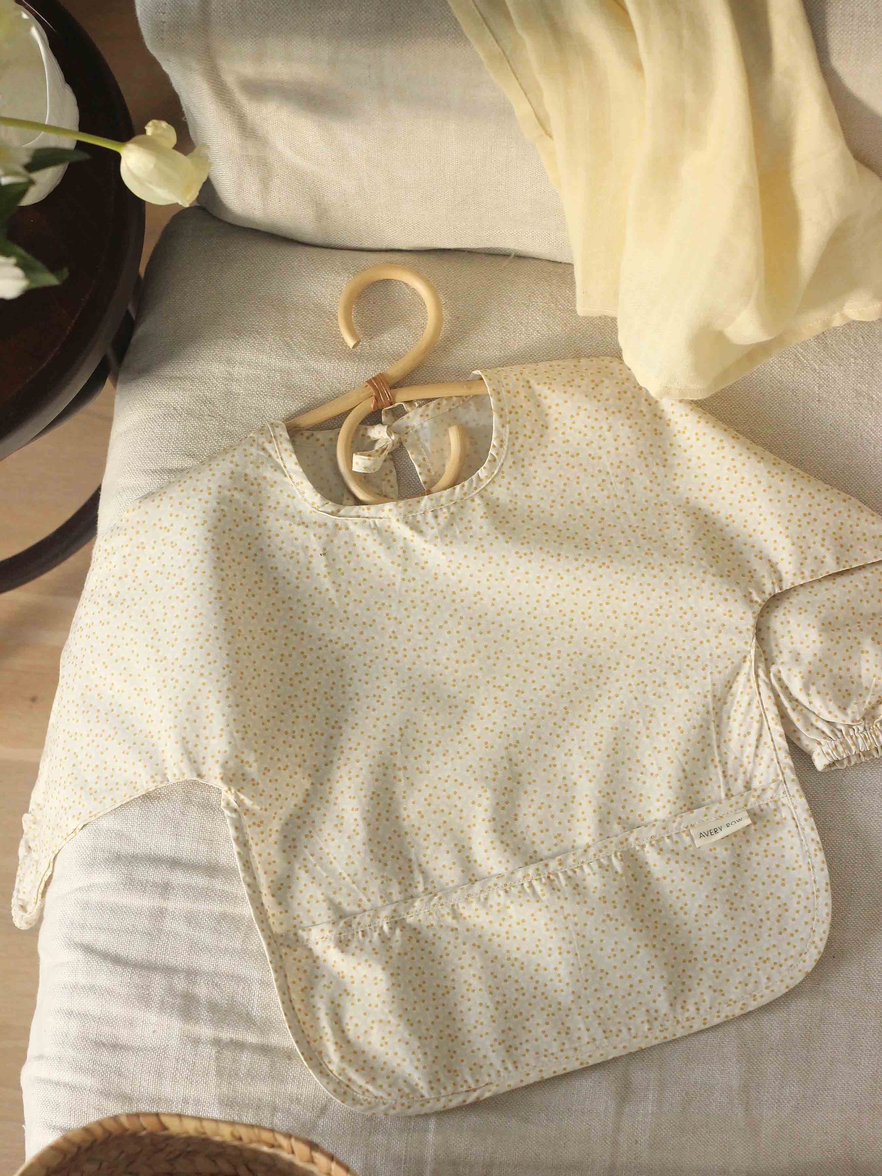 Daisy Meadow Sleeved Bib - Image 1 of 4 Daisy Meadow Sleeved Bib - Image 1 of 4