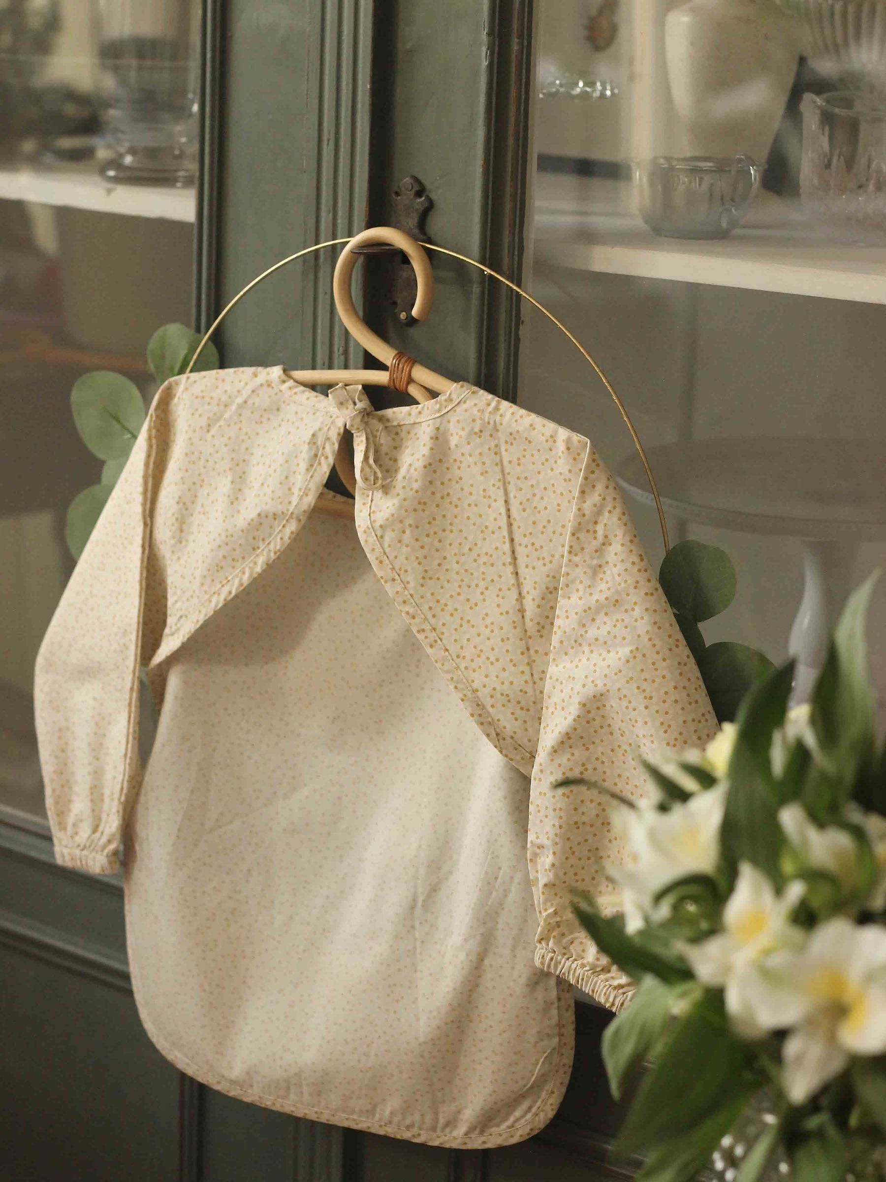 Daisy Meadow Sleeved Bib - Image 2 of 4 Daisy Meadow Sleeved Bib - Image 2 of 4