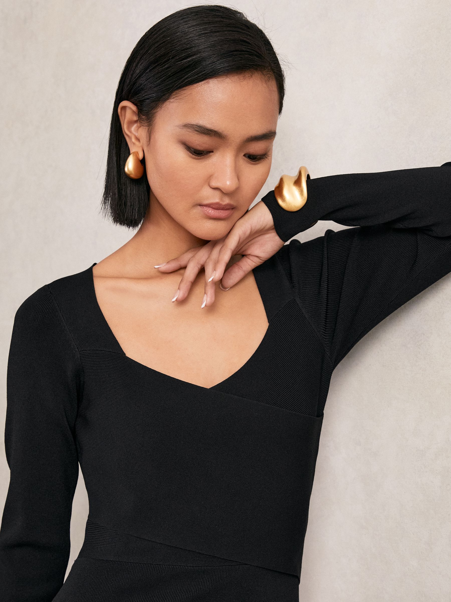 Knitted Wrap-Front Midi Dress in Black - image 3