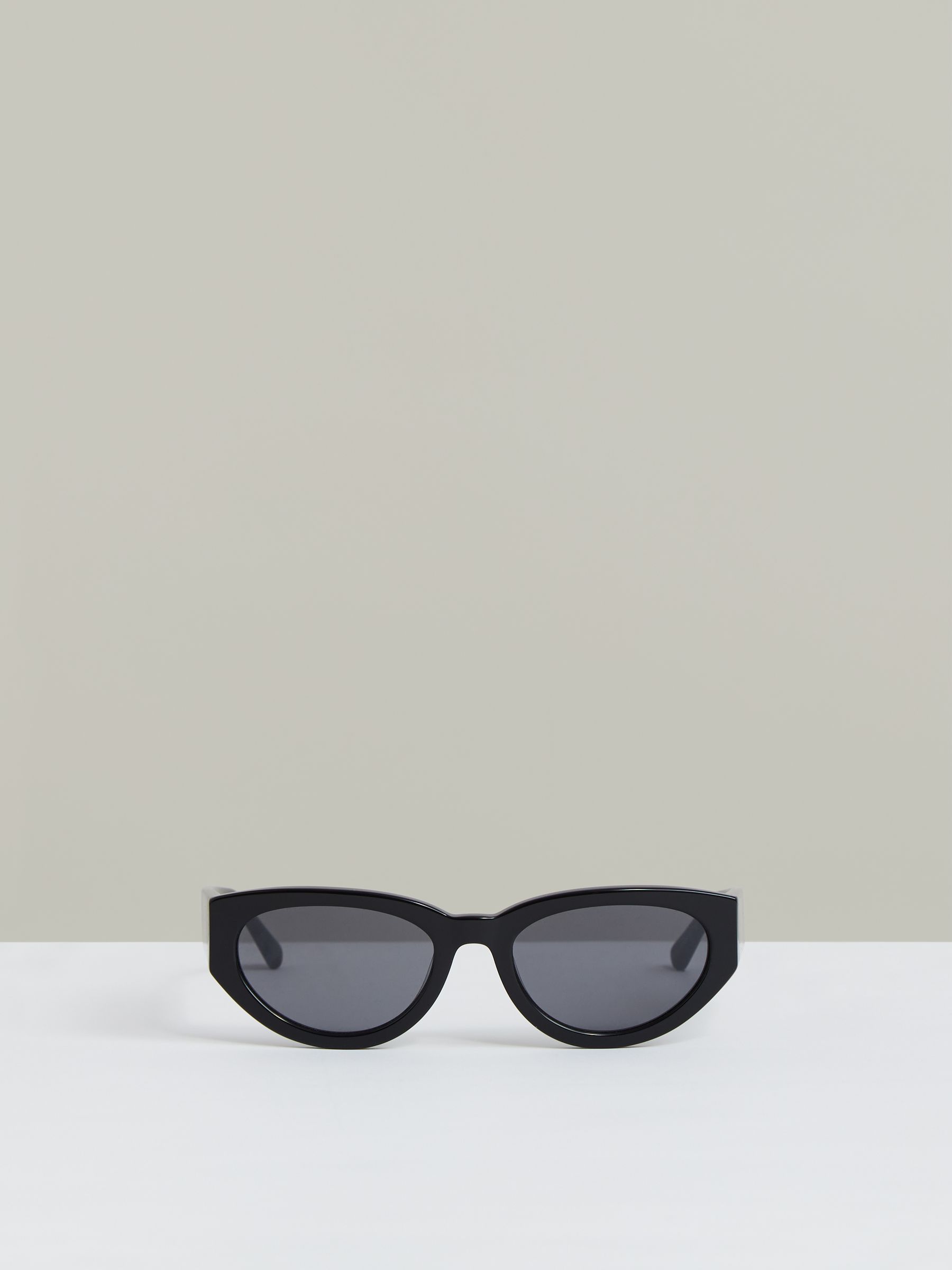 MESSYWEEKEND Oval Frame Sunglasses in Black - Image 1 of 3