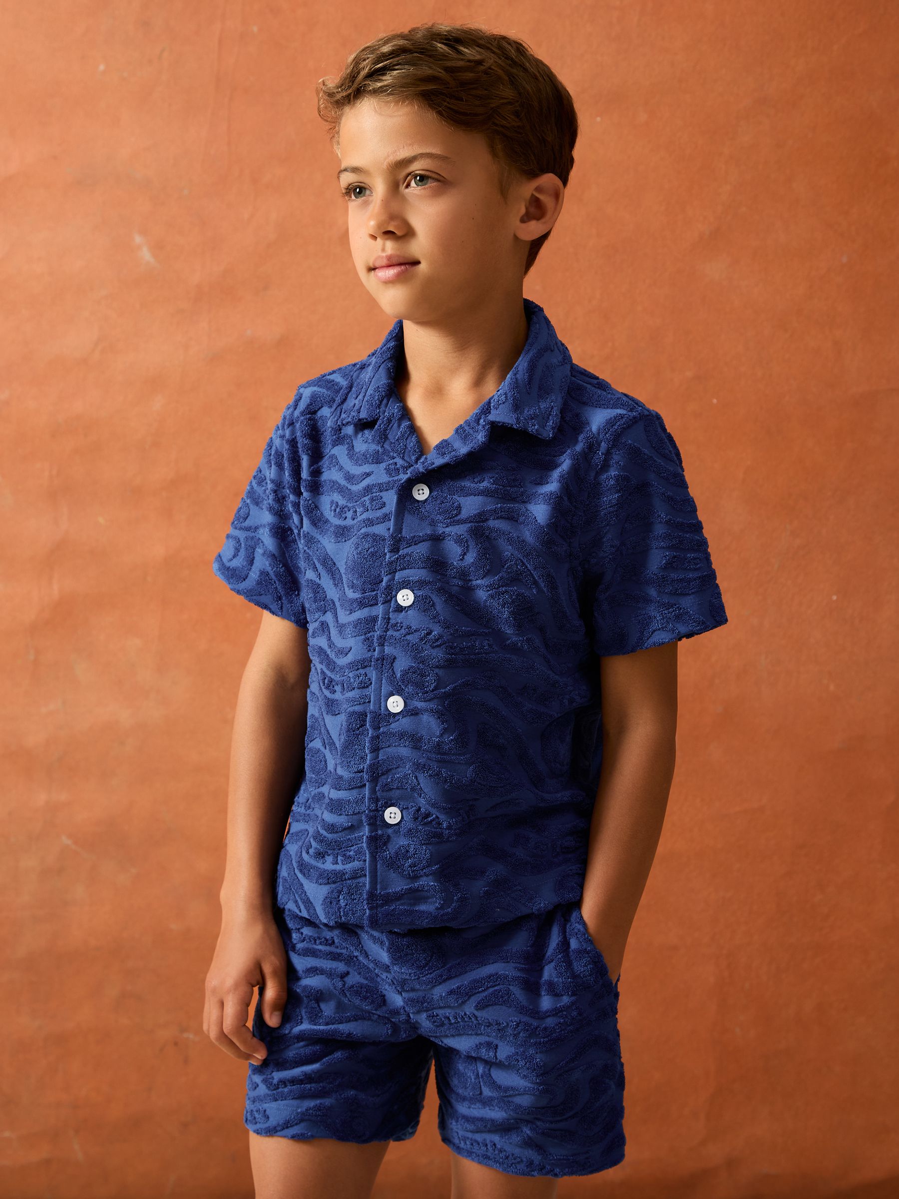 3-9 yrs SmileyWorld | Reiss Wave Texture Shirt in Bright Blue - Image 1 of 4 3-9 yrs SmileyWorld | Reiss Wave Texture Shirt in Bright Blue - Image 1 of 4