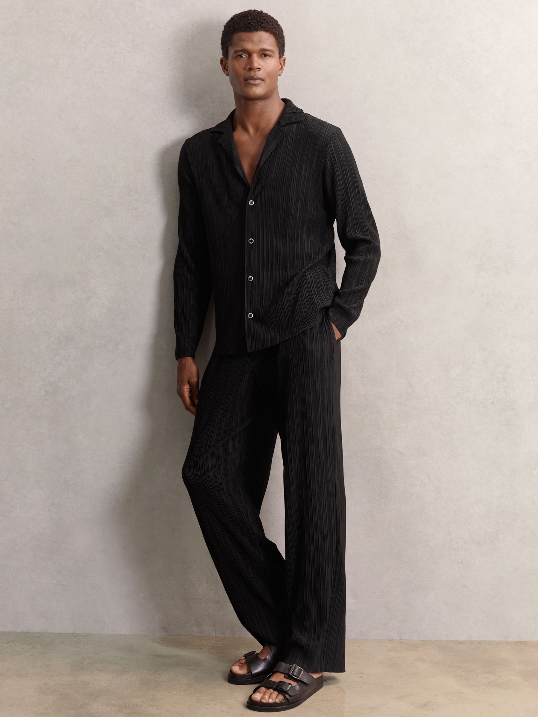 Wide Leg Plisse Trousers in Black - Image 1 of 6
