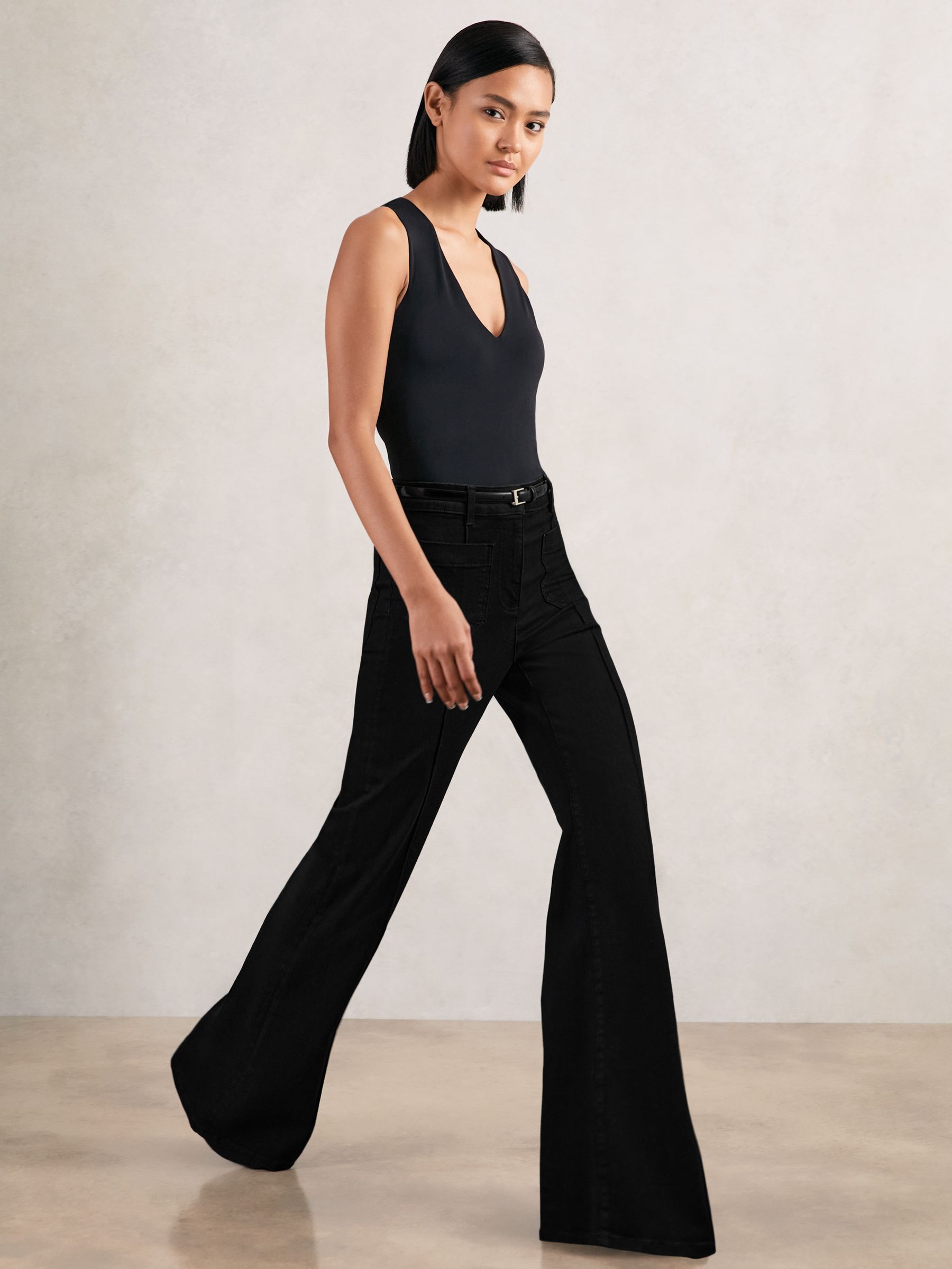 Patch-Pocket Flared Jeans in Black - Image 4 of 8