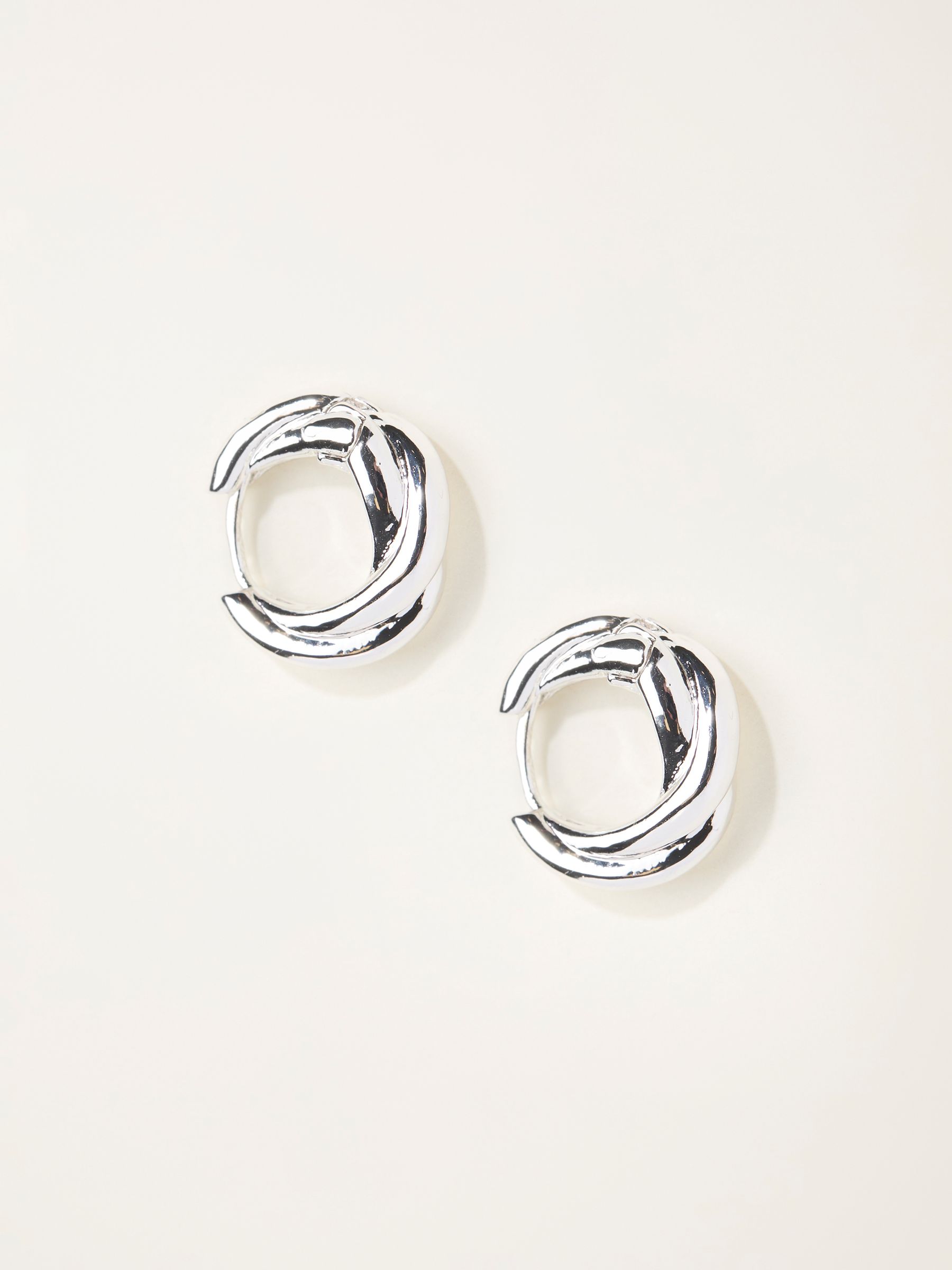 Silver Tone Twist Hoop Earrings - Image 1 of 2